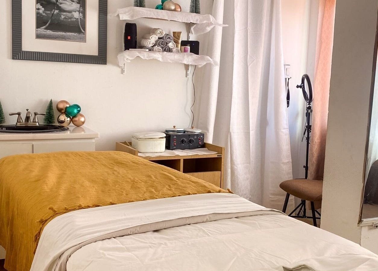 Tranquil spa room at Nelly's Touch Of Elegance Day Spa, Philipsburg, SX with cozy massage table.