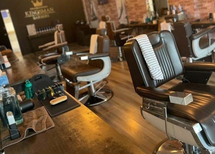 Stylish barber chairs inside Carlisle St in Balaclava salon, Melbourne, Victoria, AU near Woolworths.