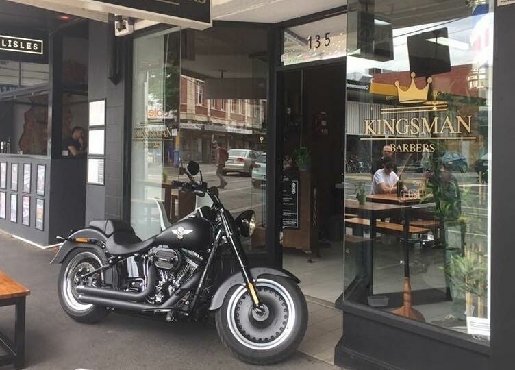 Kingsman Barbers entrance on Carlisle St in Balaclava, Melbourne, Victoria, AU showcasing a modern design.