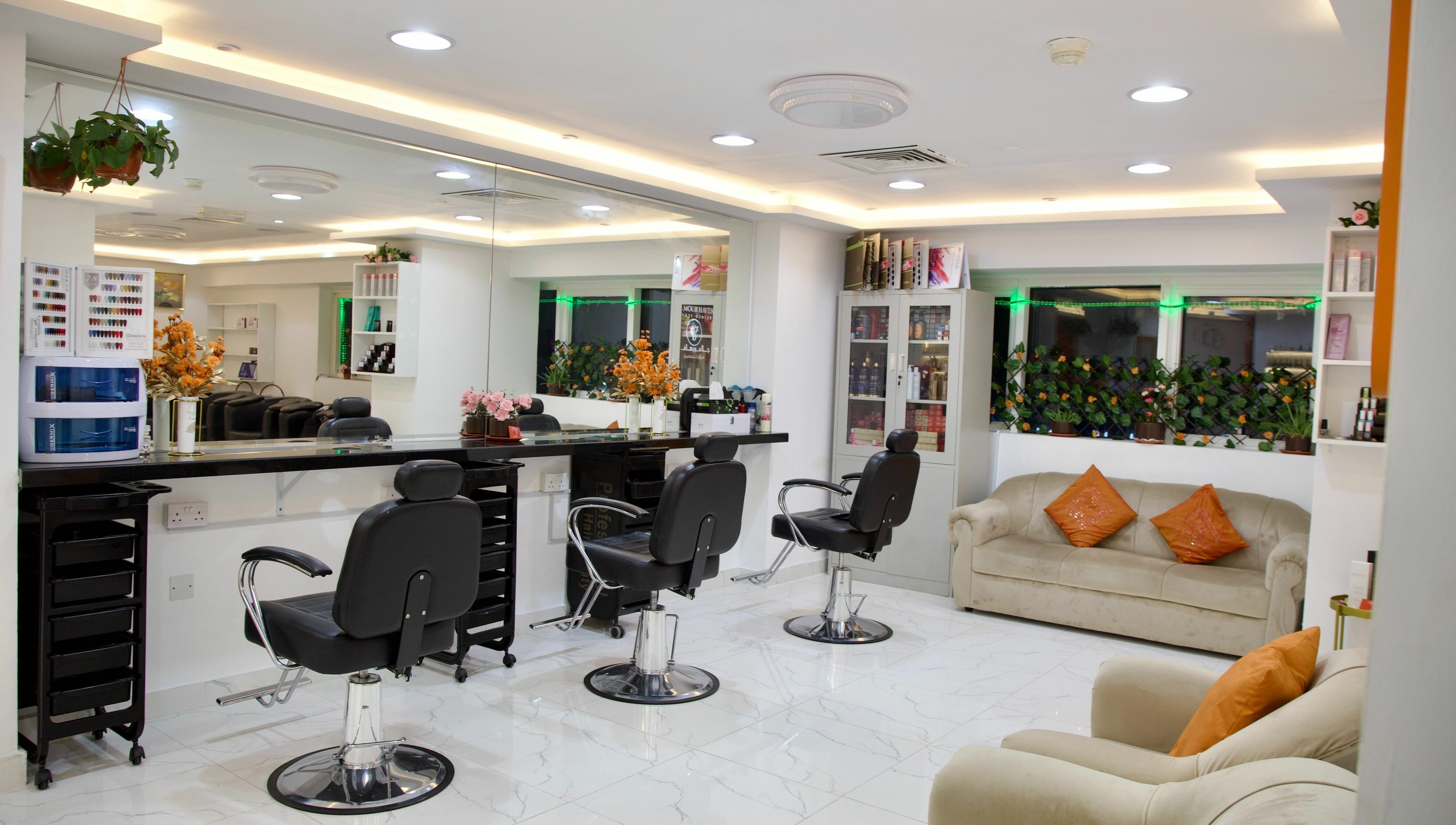 Modern salon interior at Glamour Haven Beauty Center in Abu Dhabi, Abu Dhabi, AE with stylish chairs and decor.