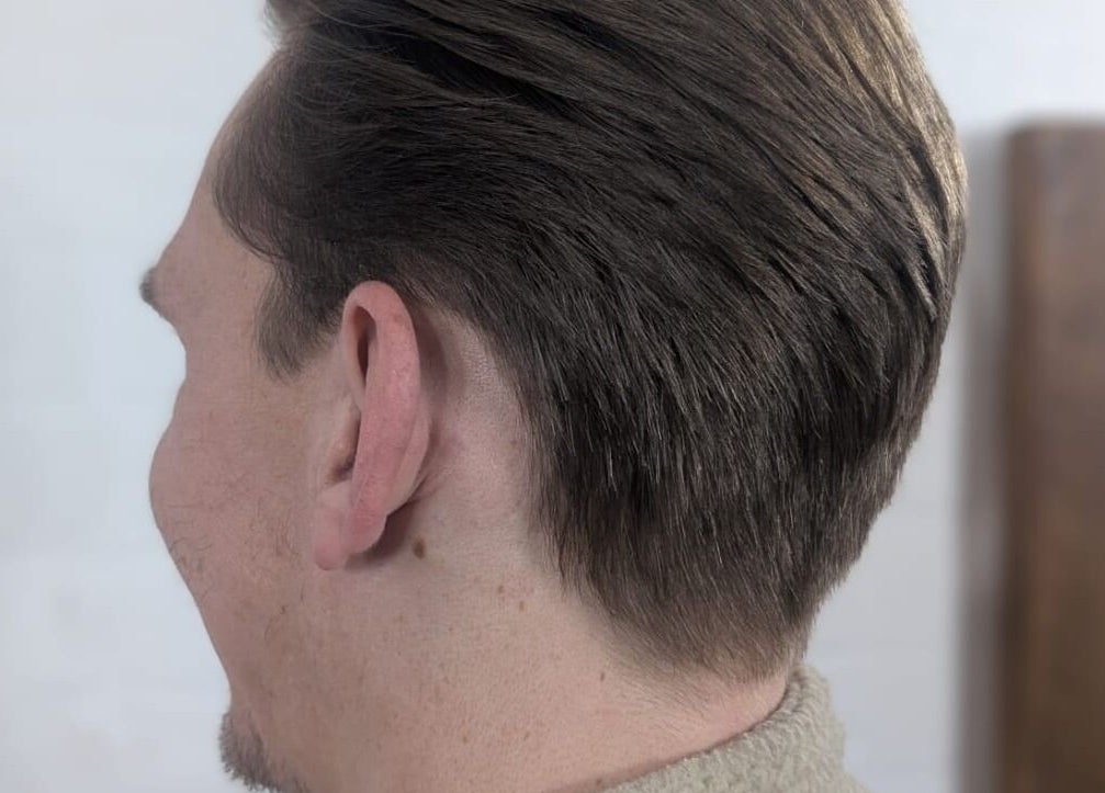 Groomed hairstyle at Alice Capriotti, Lavenham, England, GB. Ideal for modern elegance and style.