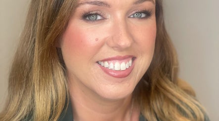 Close-up of a woman with a radiant smile at INSKA Make Up Artist, Edinburgh, Scotland, GB.