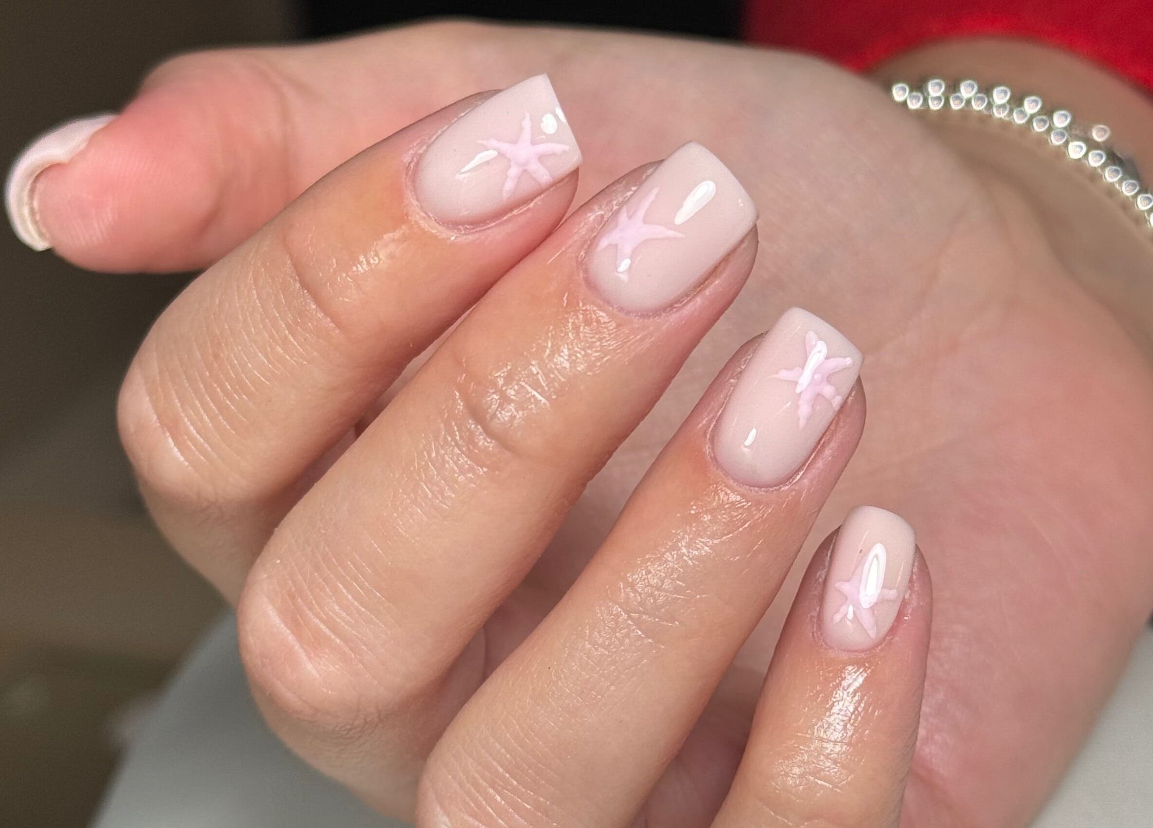 Beautiful nail art with pink designs at Biabbarr, Cardiff, Wales, GB.