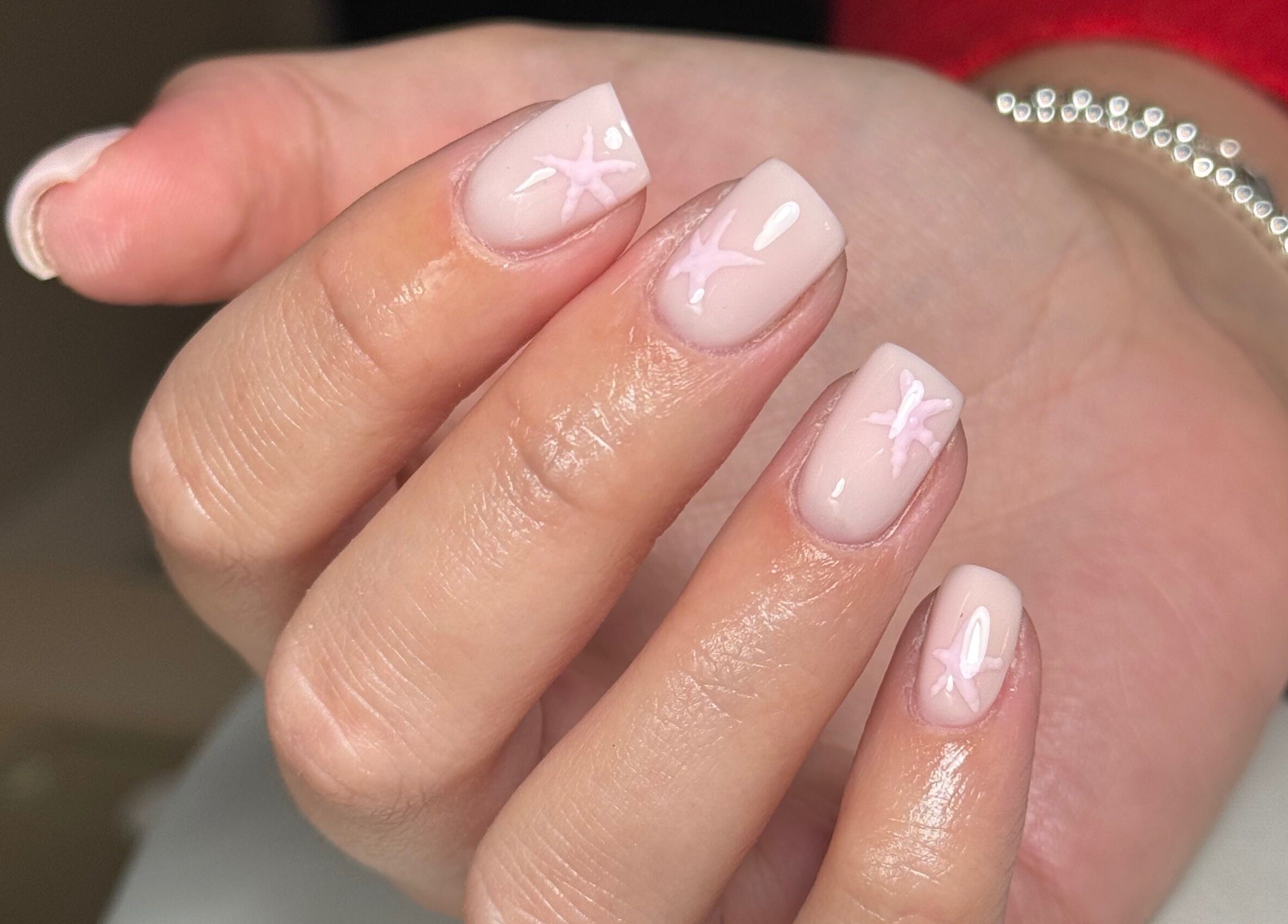 Close-up of elegant nail art with star designs at Biabbarr, Cardiff, Wales, GB.