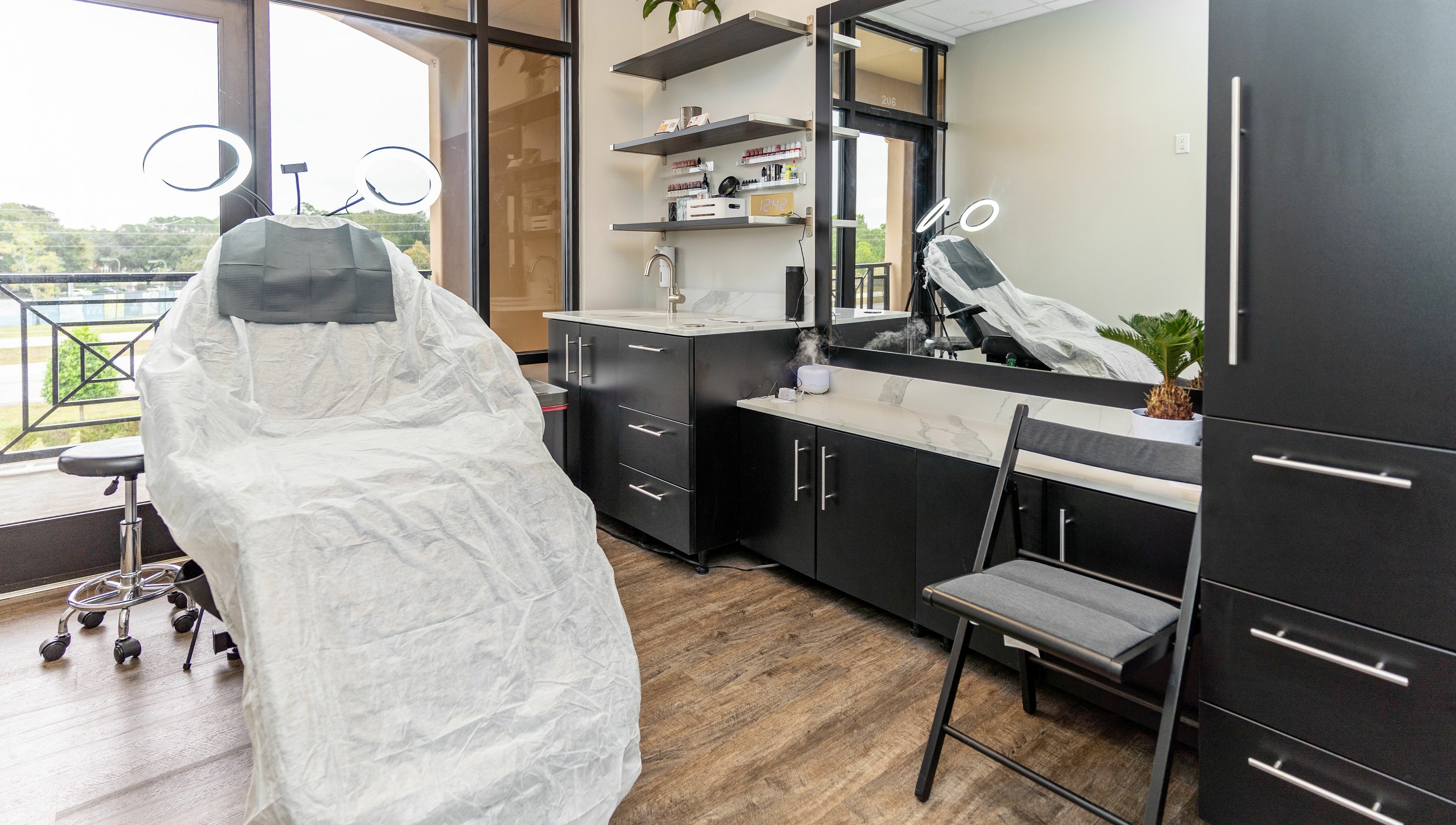 Modern treatment room at Phi Beauty Spa - Total Salons Unit #126 in Neptune Beach, Florida, US.