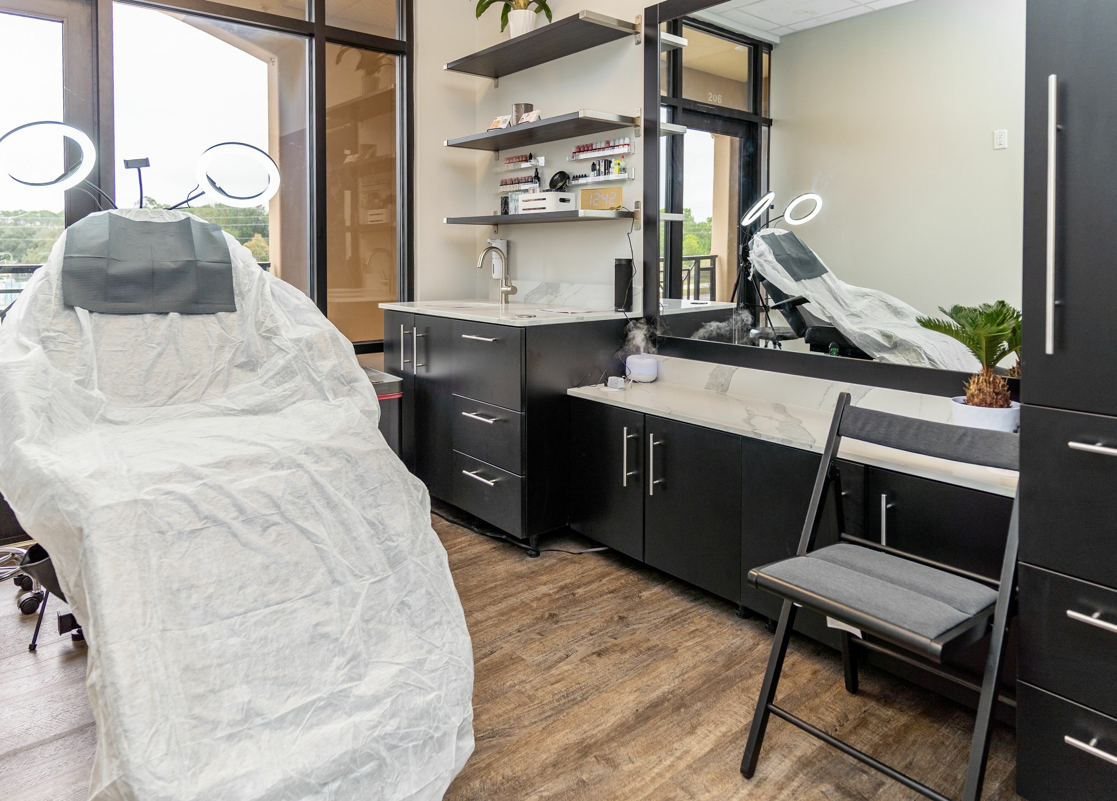 Modern treatment room at Phi Beauty Spa - Total Salons Unit #126 in Neptune Beach, Florida, US.