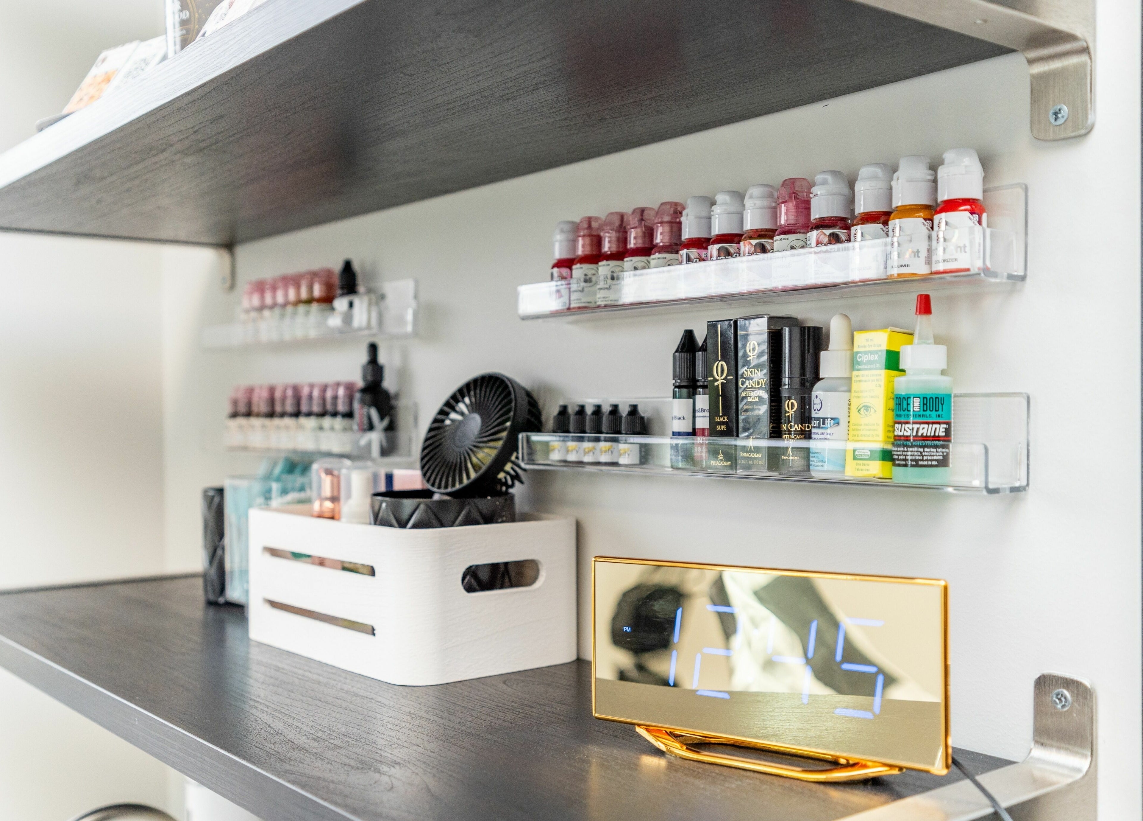 Elegant shelf with beauty products at Phi Beauty Spa - Total Salons Unit #126, Neptune Beach, Florida, US.