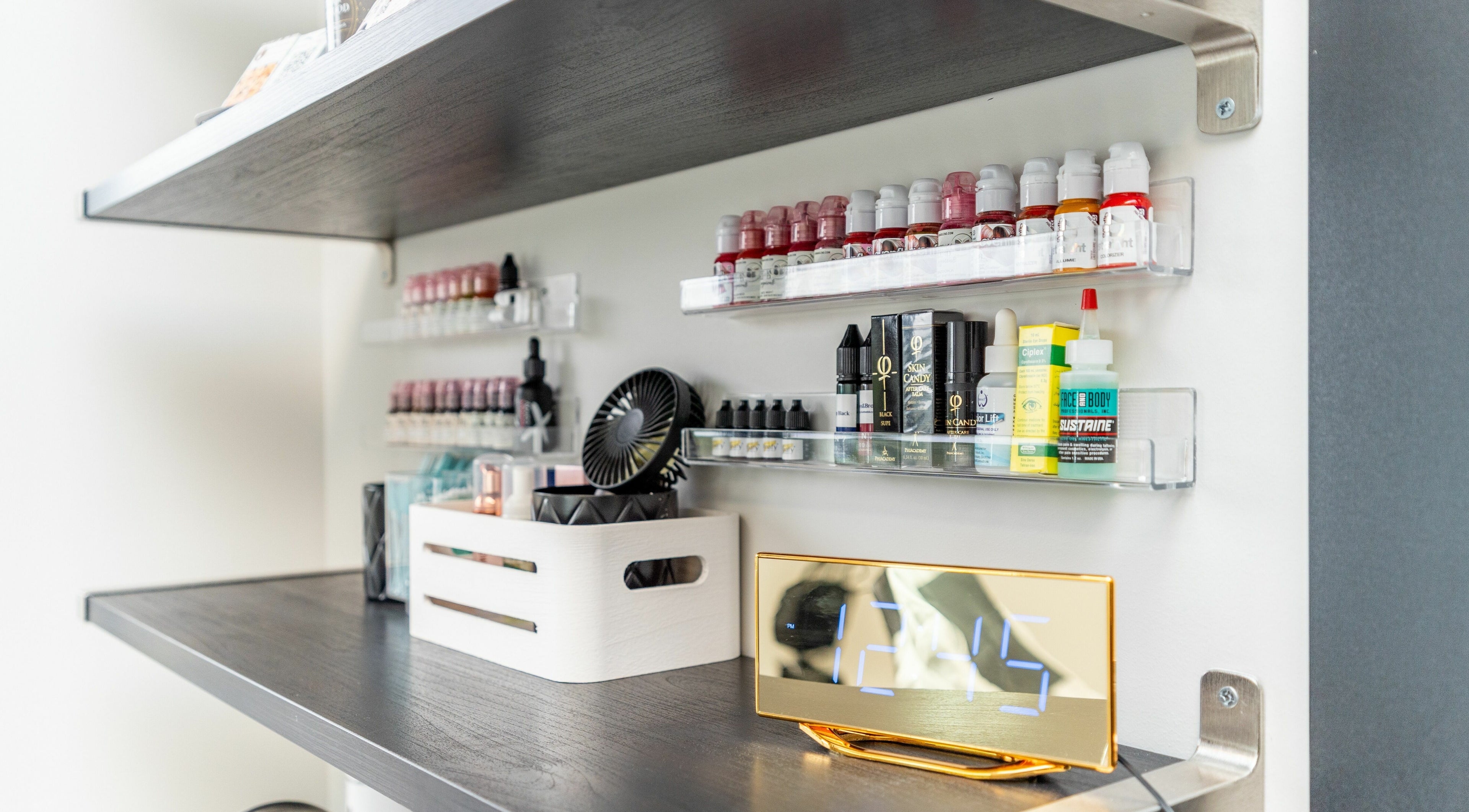 Elegant shelf with beauty products at Phi Beauty Spa - Total Salons Unit #126, Neptune Beach, Florida, US.