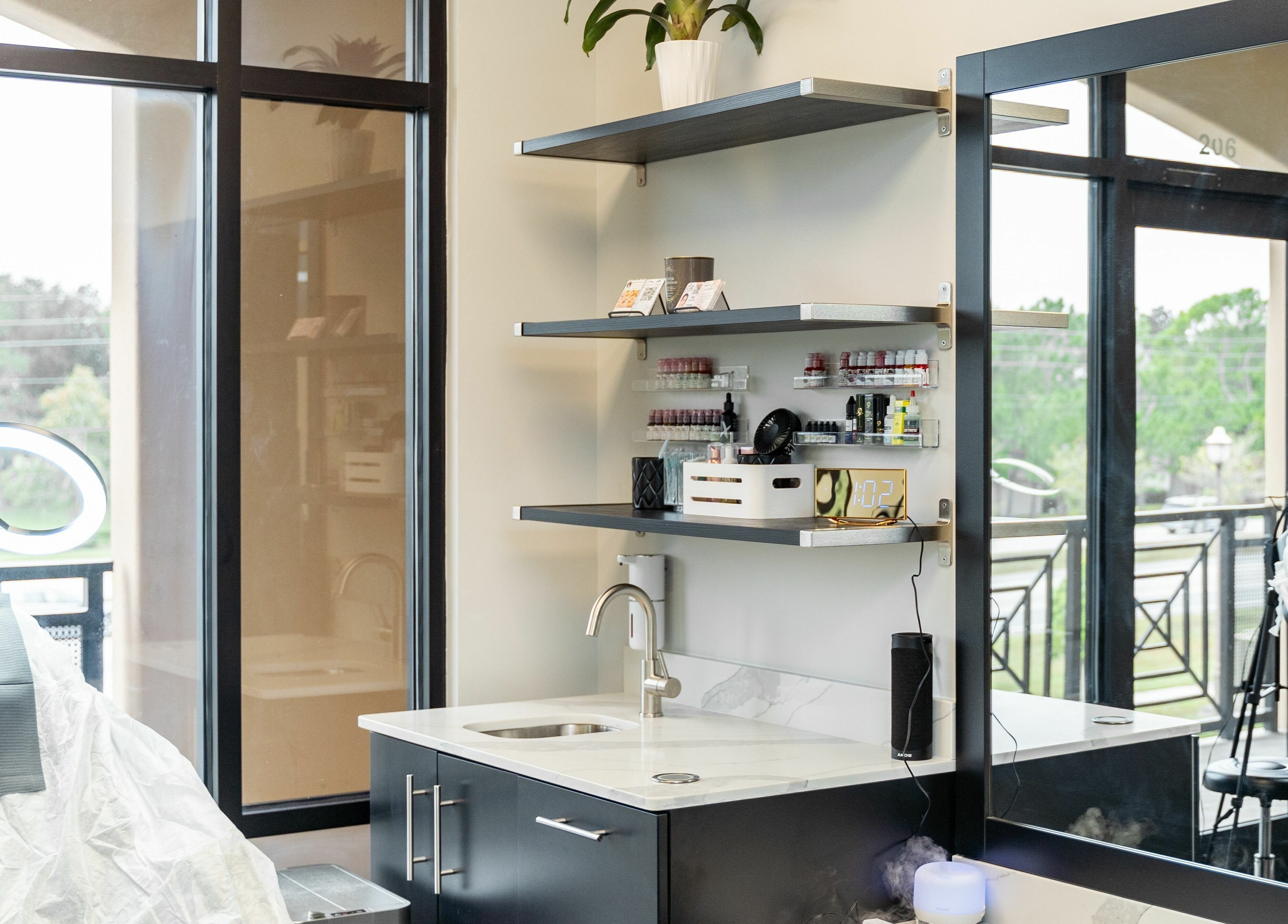 Interior view of Phi Beauty Spa - Total Salons Unit #126, showcasing a modern setup in Neptune Beach, Florida, US.