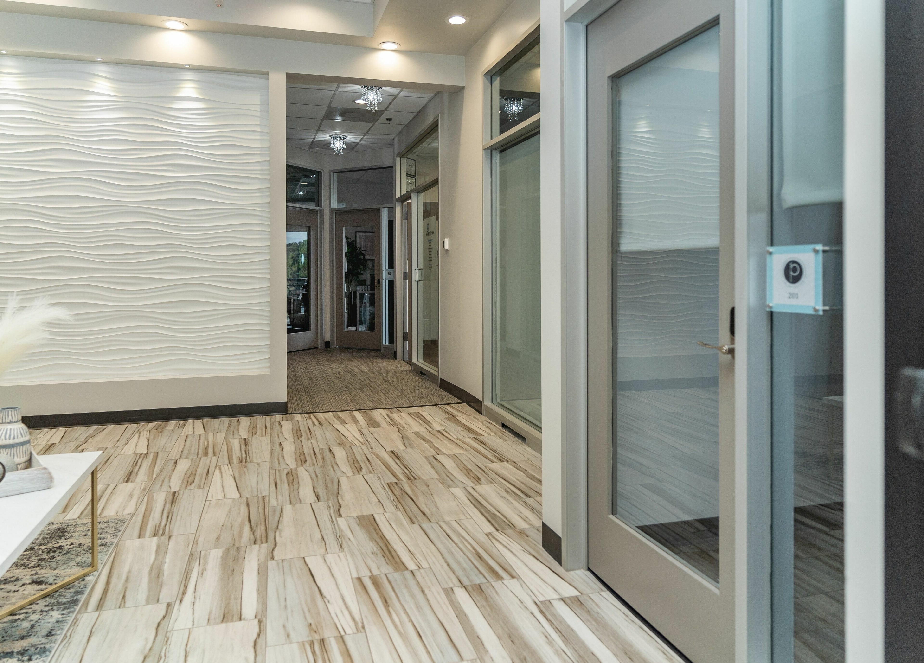 Modern lobby of Phi Beauty Spa - Total Salons Unit #126, Neptune Beach, Florida, US with elegant decor.