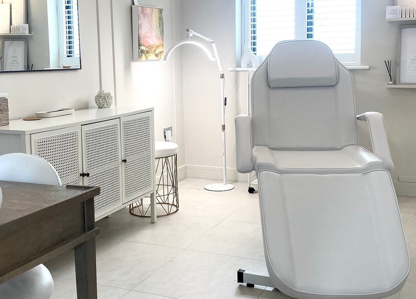 Elegant treatment room at R Skin Aesthetics, Evesham, England, GB with modern decor and comfortable chair.