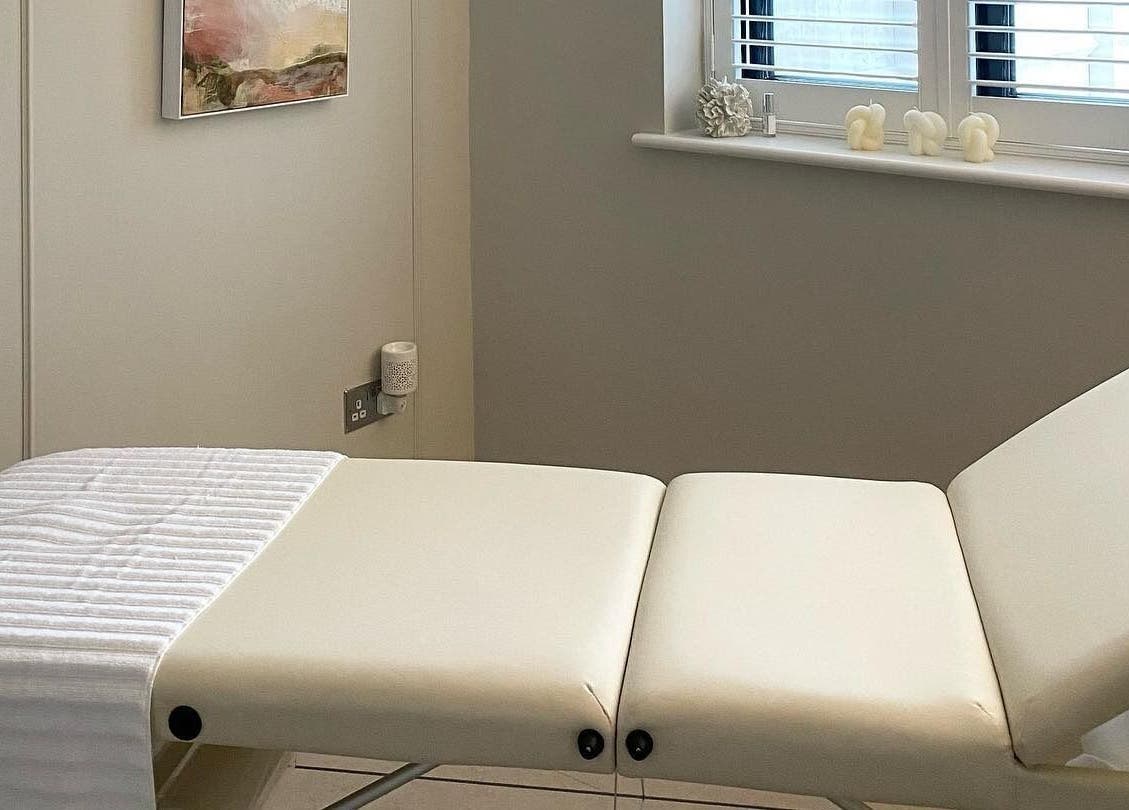 Serene treatment room at R Skin Aesthetics, Evesham, England, GB with a comfortable bed.