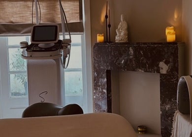 Relaxing spa room at By Chan Bodycare, Amsterdam, Noord-Holland, NL with candles and modern equipment.