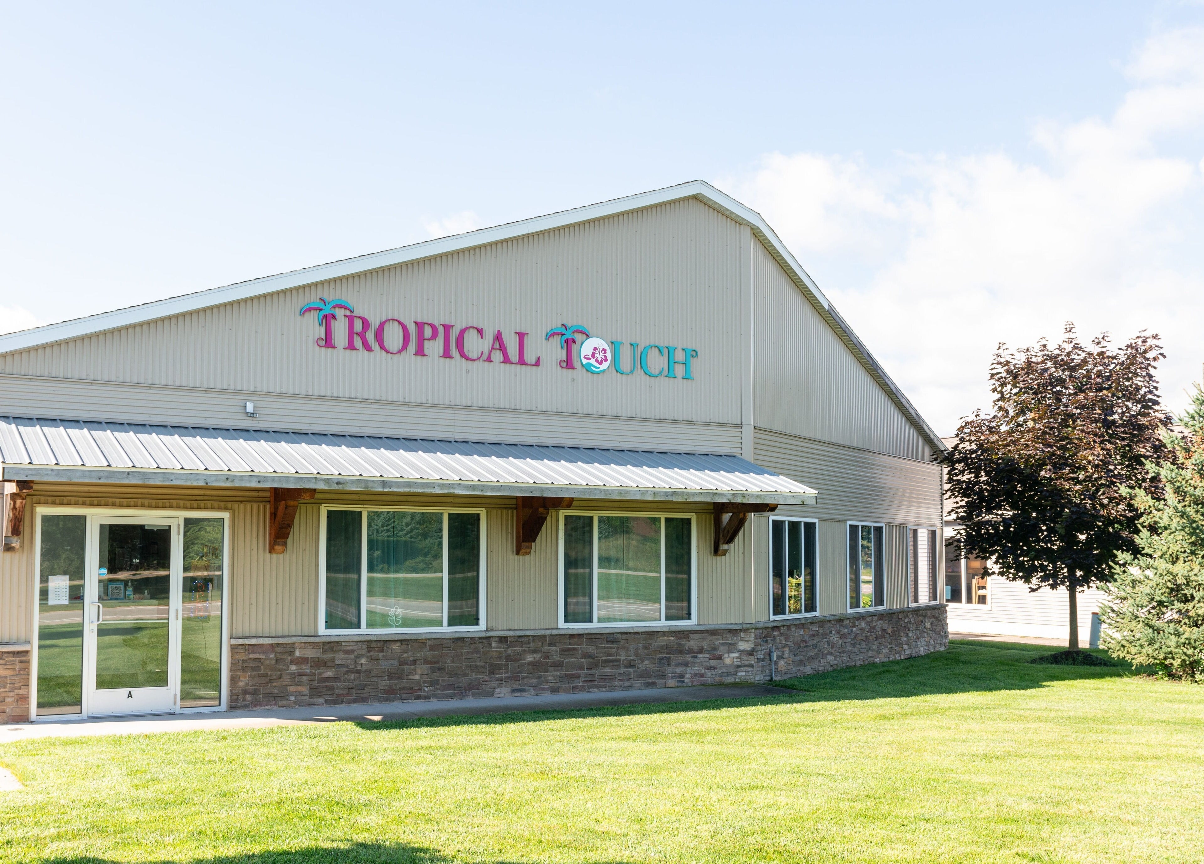 Front view of Tropical Touch Spa, a serene beauty venue in Jenison, Michigan, US.