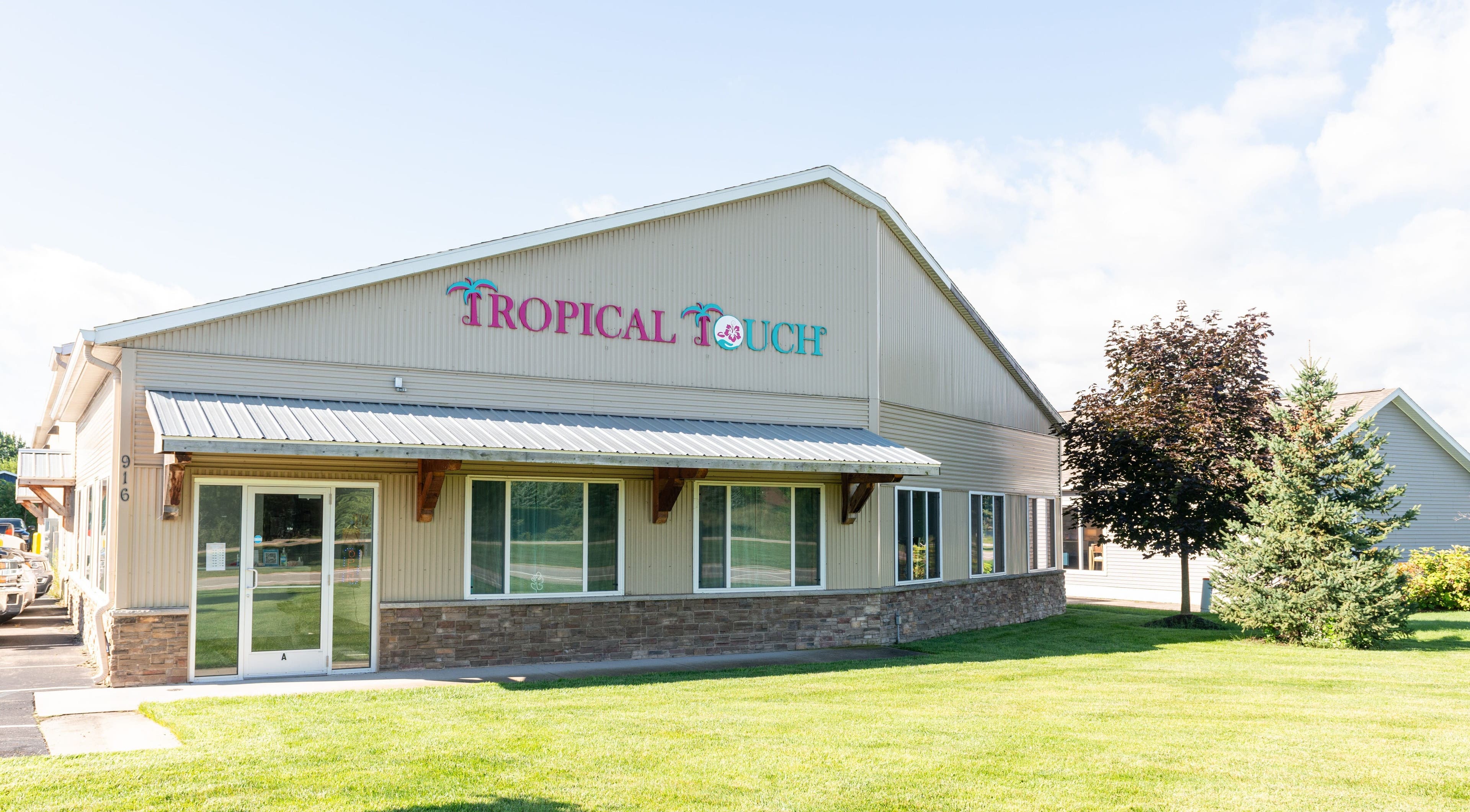 Front view of Tropical Touch Spa, a serene beauty venue in Jenison, Michigan, US.