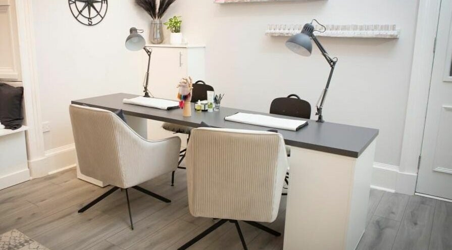 Modern manicure station at East Lothian Beauty, North Berwick, Scotland, GB, featuring chic decor and lighting.
