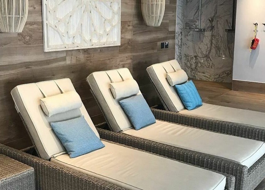 Relaxing loungers at The Hampton Spa, Failand, England, GB. Elegant decor creates a soothing atmosphere.