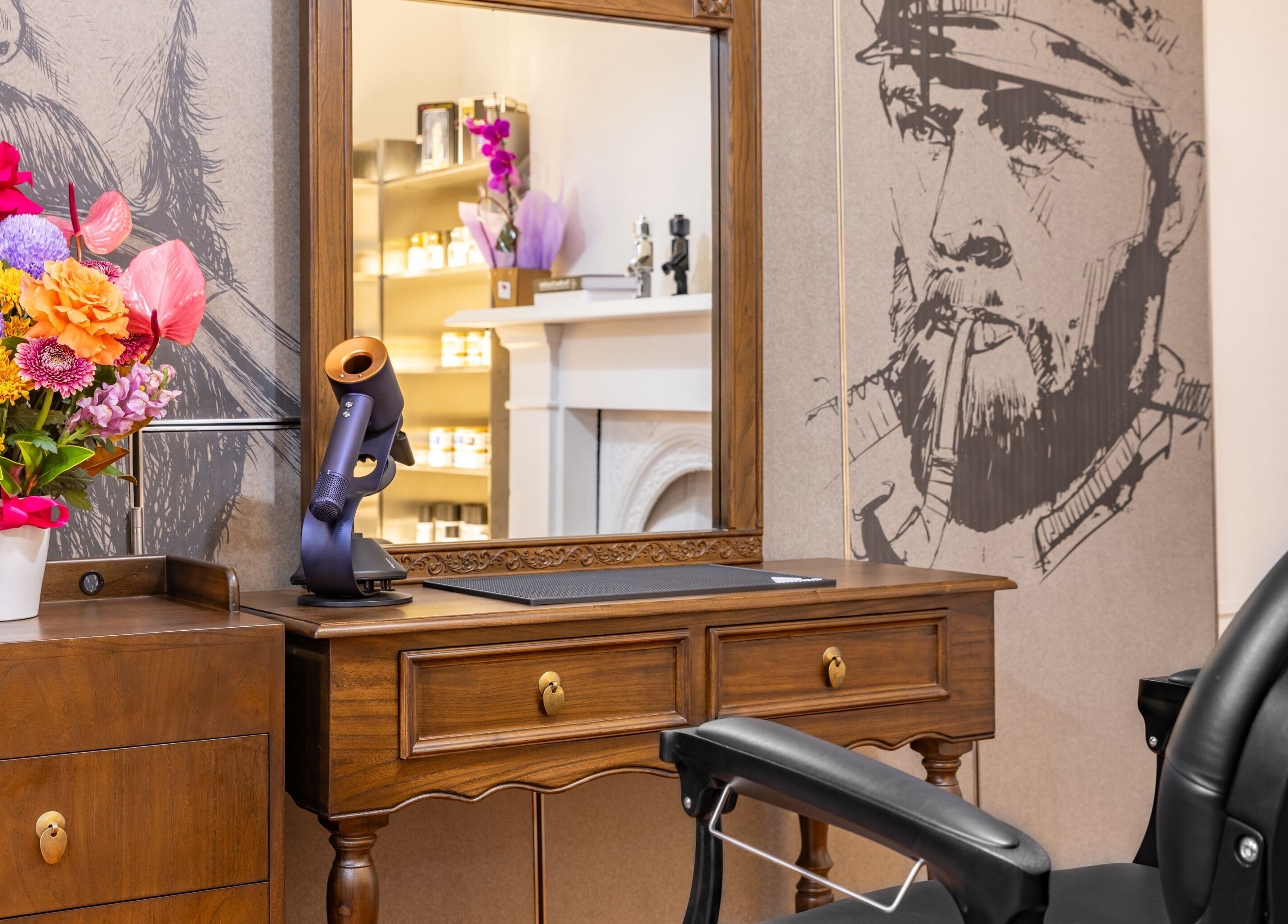 Chic interior with barber chair and floral decor at Uptown Barbers The Rocks, New South Wales, AU.