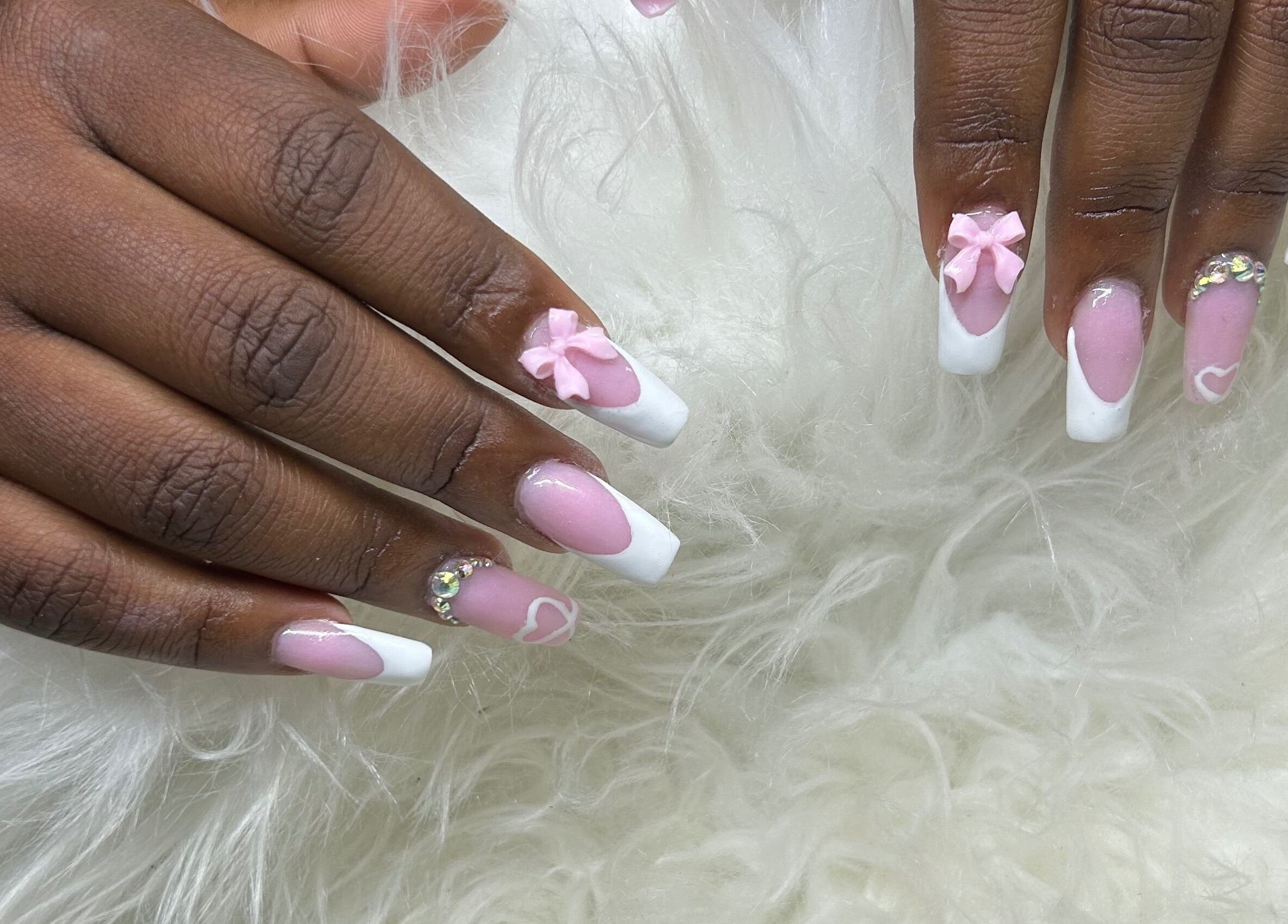 Elegant pink and white nail art with bows at Becs Beauty Lab, Nassau, New Providence, BS.