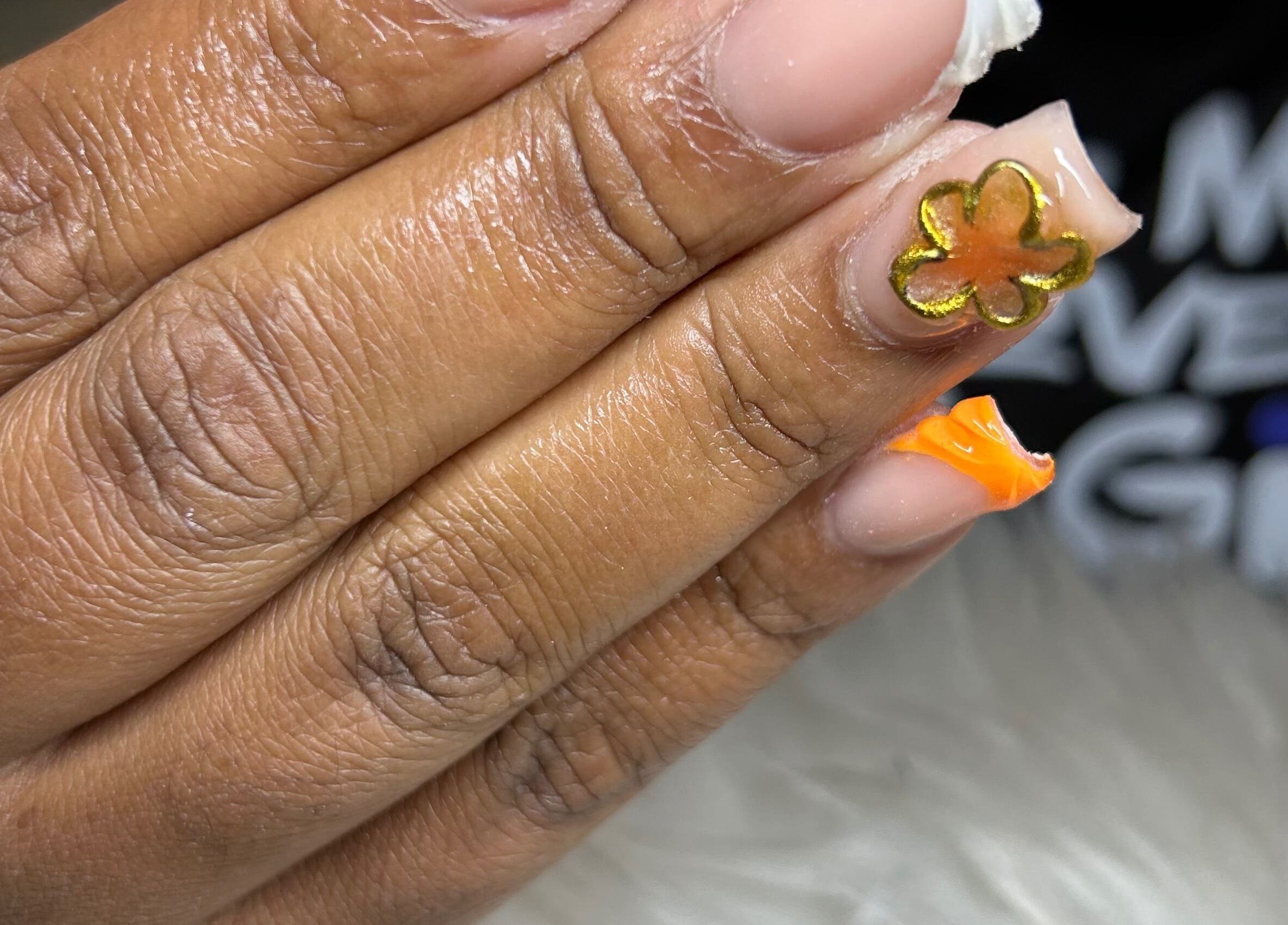Elegant floral nail art at Becs Beauty Lab, Nassau, New Providence, BS showcasing intricate design.