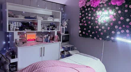 Calm treatment room at Skin Serenity Spa and Wax Studio, Tunapuna, TT with pink decor and floral accents.