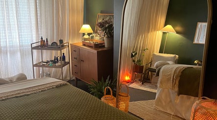 Cozy wellness room at Autumn Recharge Retreat, Leeds, England, GB, featuring ambient lighting and soothing decor.