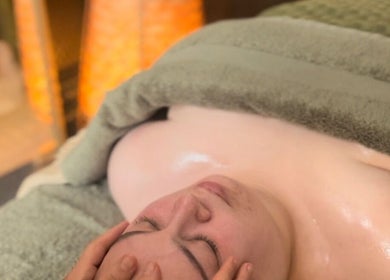 Relaxing facial massage at Autumn Recharge Retreat in Leeds, England, GB enhances tranquility and rejuvenation.
