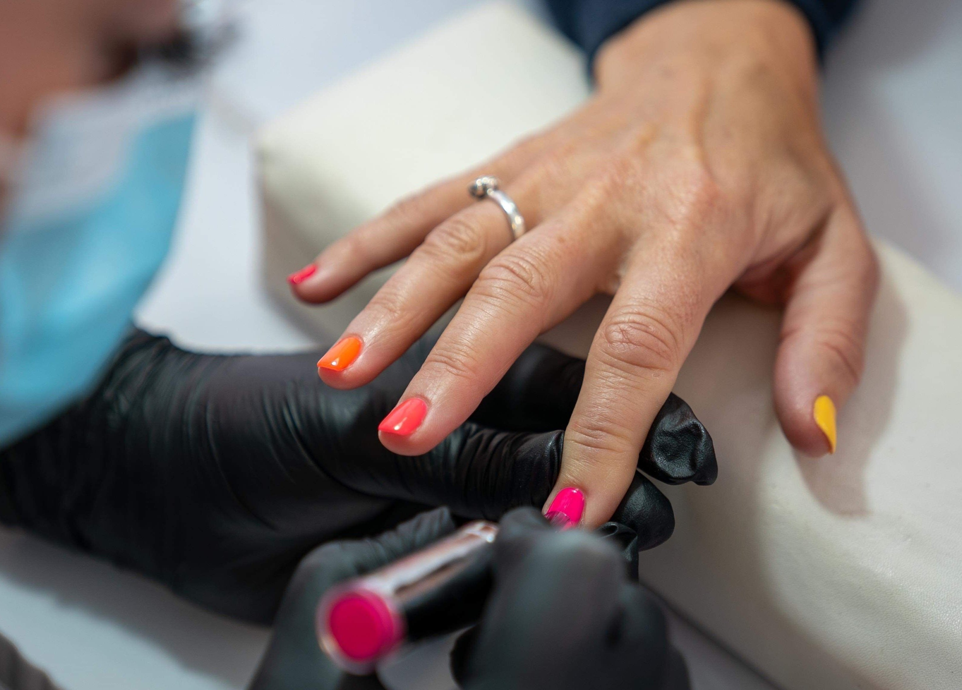 Colorful manicure at Studio One Nails and Beauty in New Milton, England, GB showcasing expert nail art.