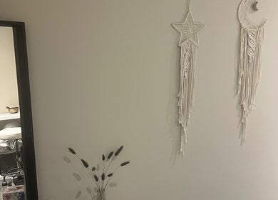 Elegant wall hangings at Beauty at the Grove, Rayleigh, England, GB, enhancing serene ambiance.