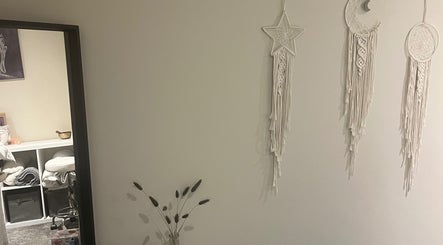 Elegant wall hangings at Beauty at the Grove, Rayleigh, England, GB, enhancing serene ambiance.