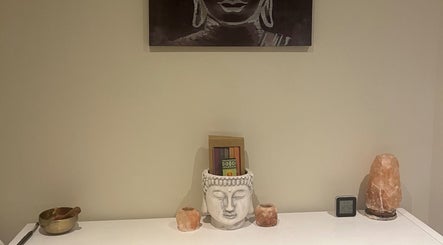 Calming meditation area with Buddha decor at Beauty at the Grove, Rayleigh, England, GB.