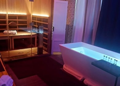 Luxurious spa room with sauna and float tub at Chesterton Mamabear Massage & Float, Chesterton, Indiana, US.
