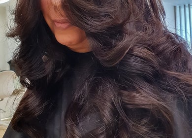 Luxurious curls styled at Massi Aldini, Paddington, New South Wales, AU, showcasing expert hair design.