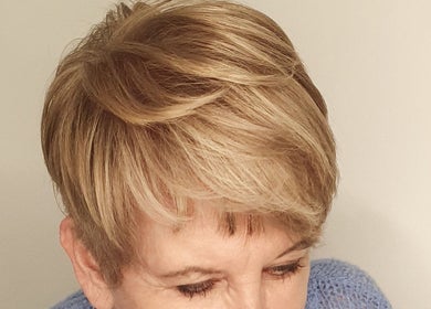 Close-up of a stylish blonde haircut at Massi Aldini, Paddington, New South Wales, AU.