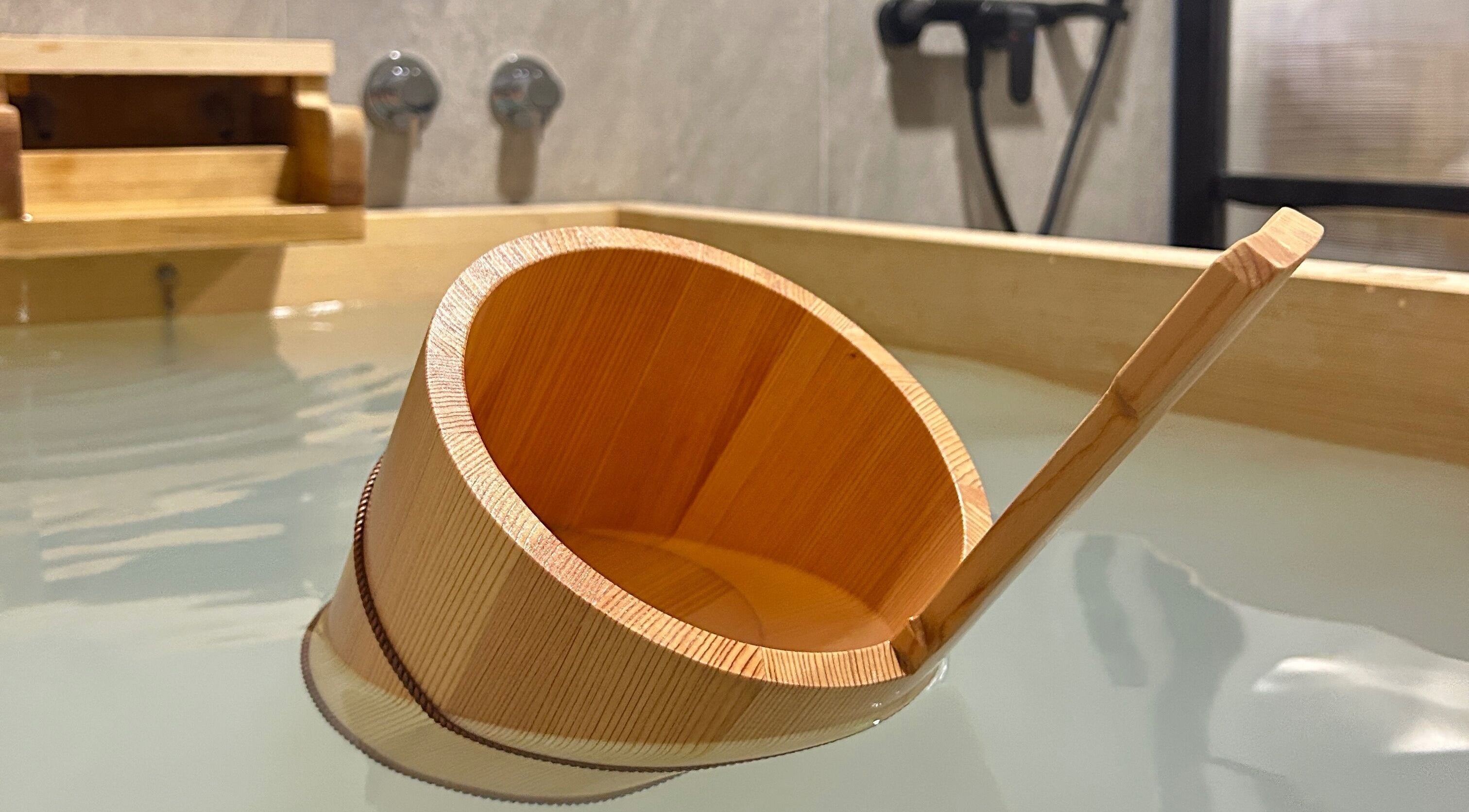 Bamboo bucket in spa bath at Sabaai Sabaai Boutique Thai Spa, Singapore, Singapore, SG.