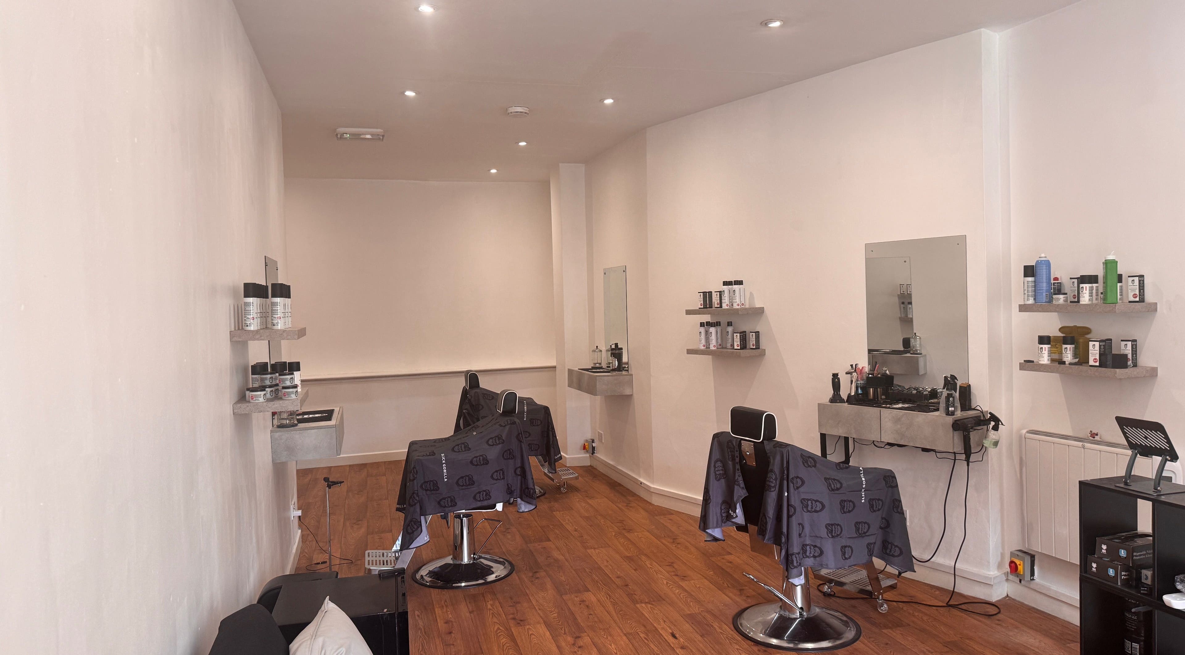 Interior view of Studio7 in Shipston-on-stour, England, showcasing modern styling chairs and beauty products.