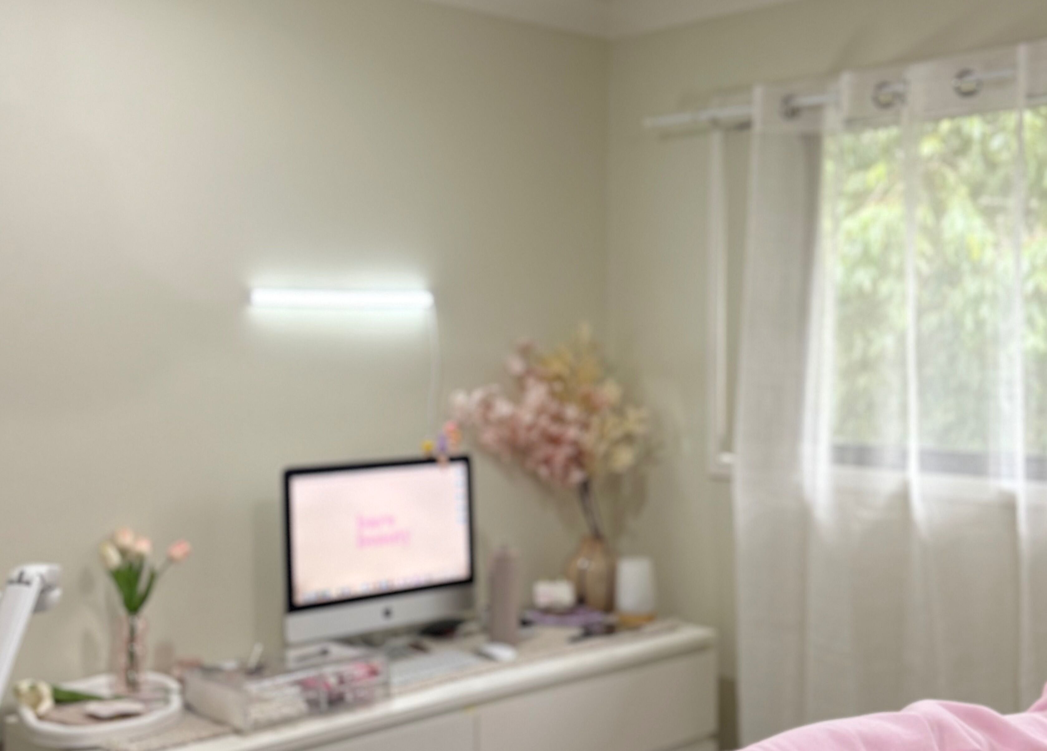 Relaxing beauty room at Barebeauty, Mudgeeraba, Queensland, AU with flowers and natural light.