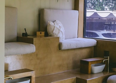 Luxurious pedicure station at Kri8tive Nails, Pretoria, Gauteng, ZA. Features plush seating and a serene ambiance.