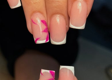 Elegant French manicure with pink accents at Holly’s Beauty, Bridgwater, England, GB.