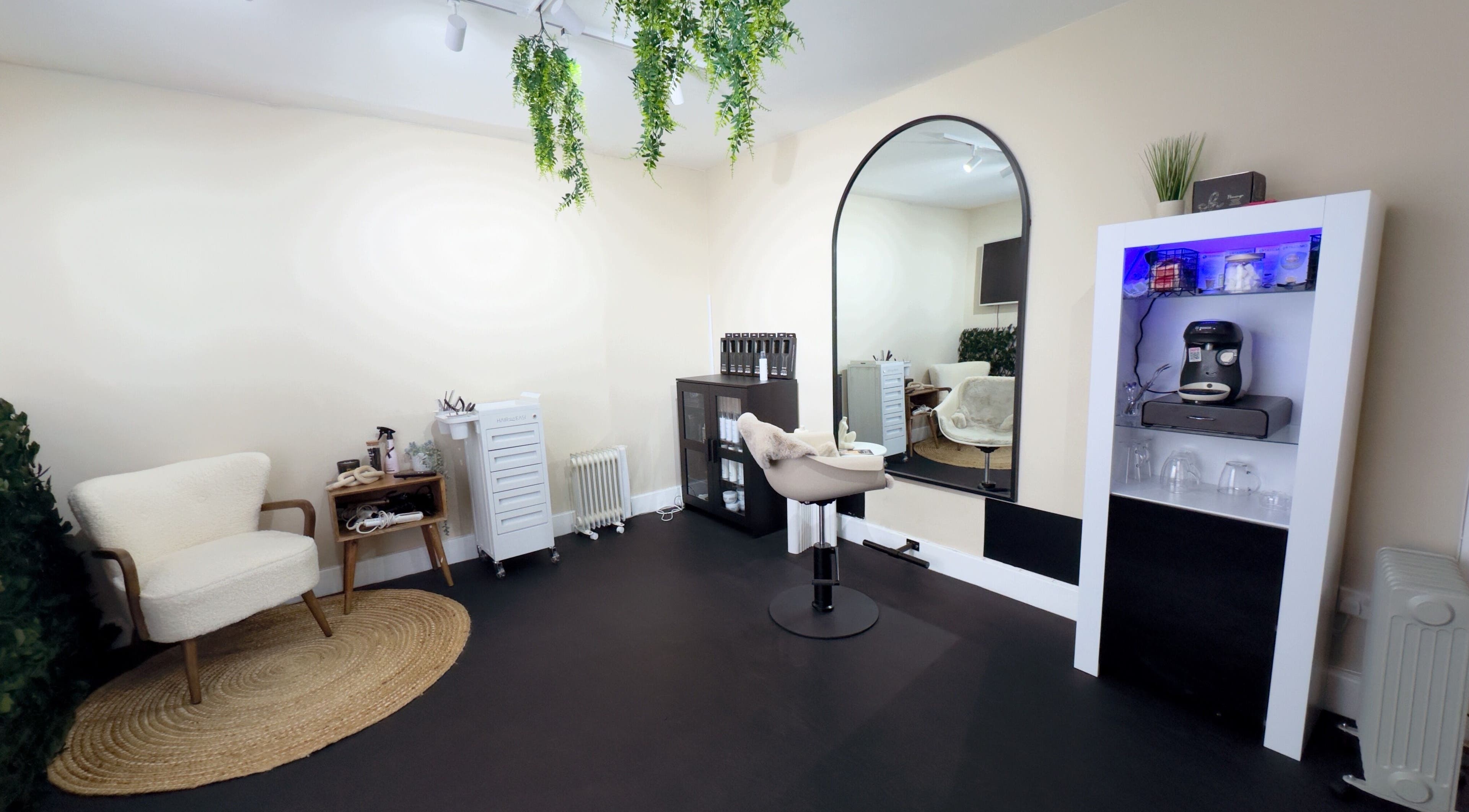 Modern salon at Hair By Nlk at Mychelle Caroline in West Bridgford, England, GB featuring stylish decor.