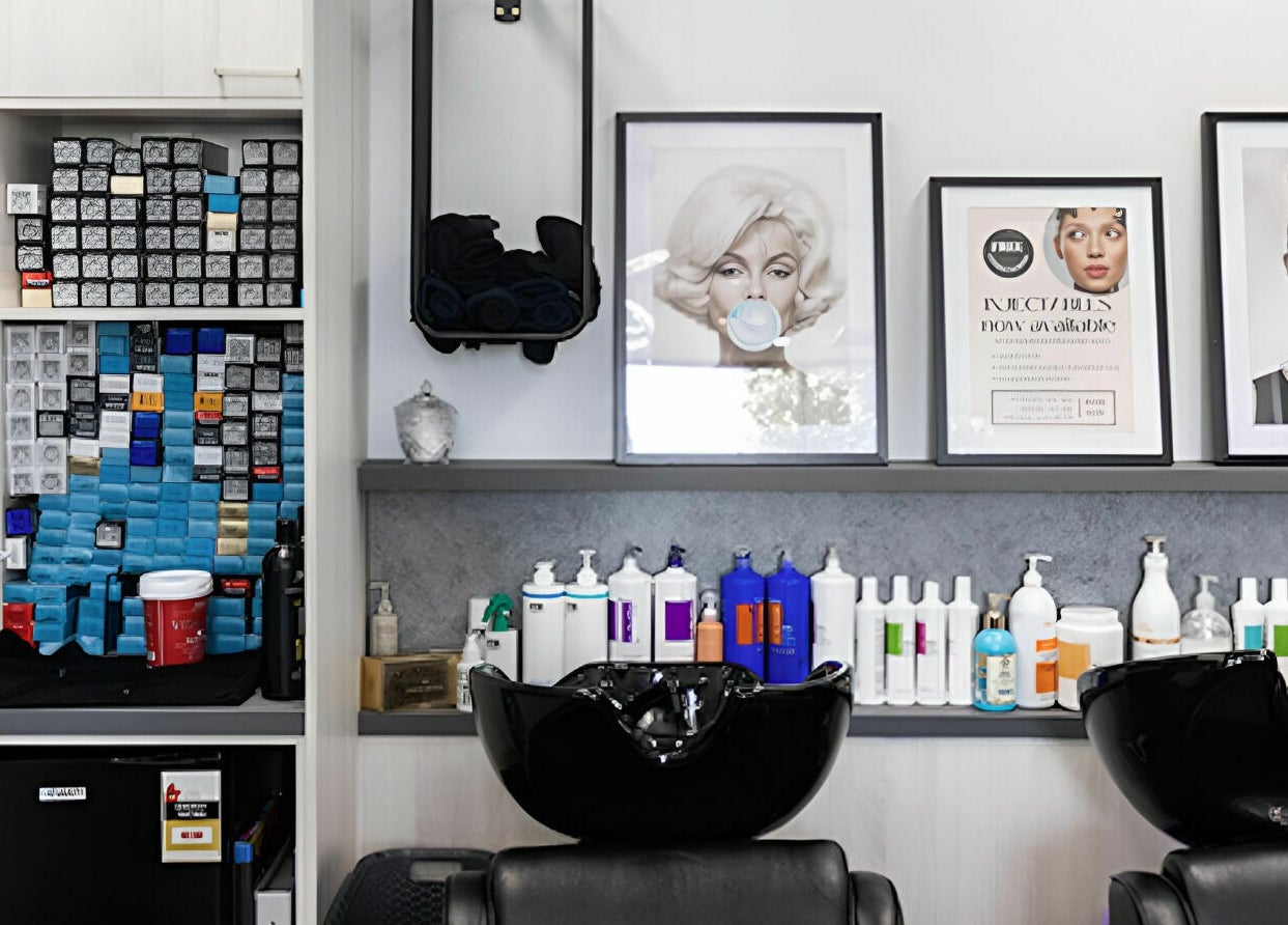 Stylish salon interior at Anita & Co Hair & Beauty in Cranbourne, Victoria, AU with chic decor and hair care products.