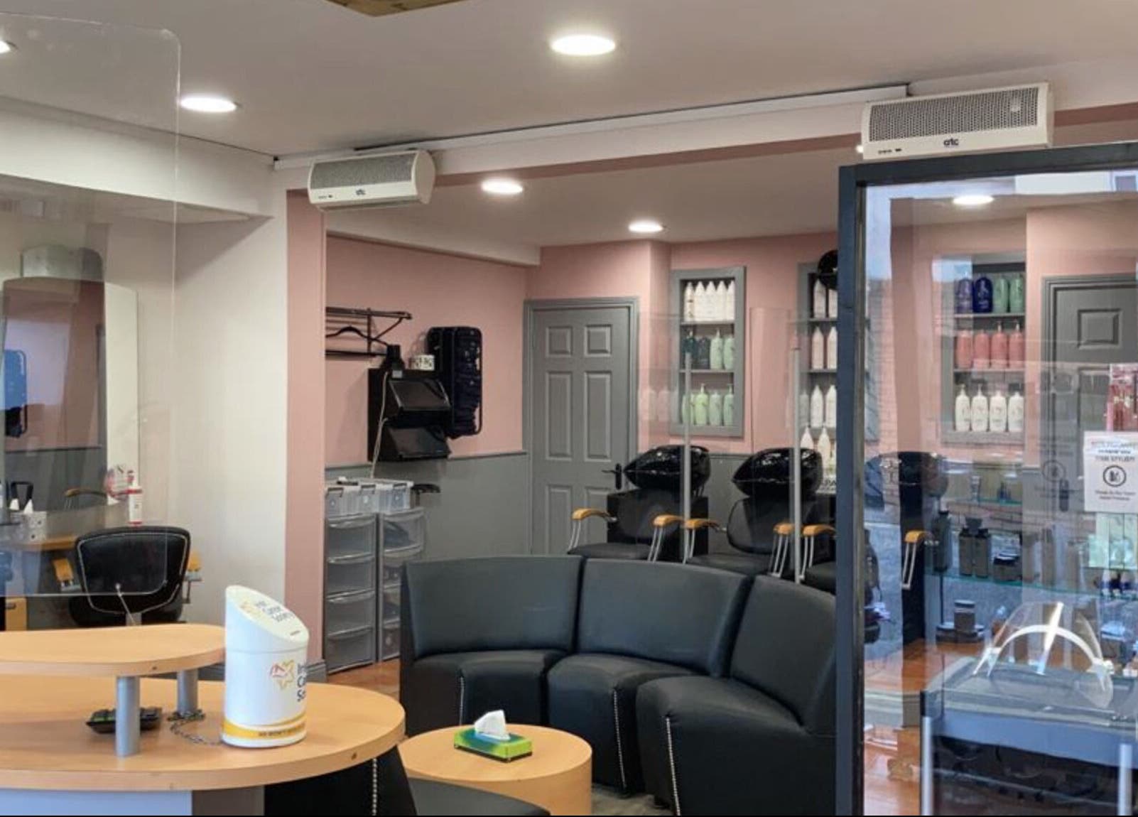 Elegant interior of Headcases Hair Salon in Ashbourne, IE, featuring modern decor and comfortable seating.