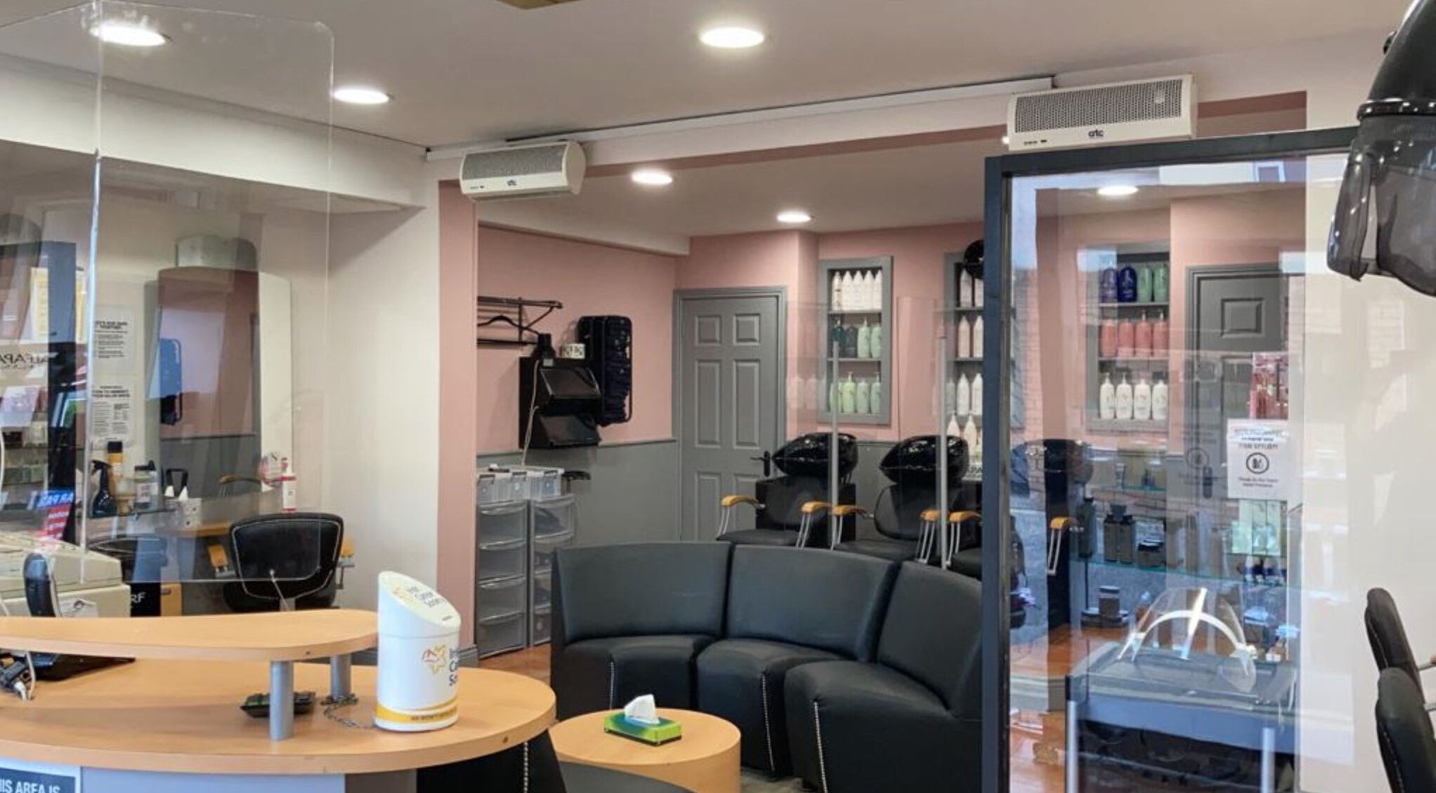 Elegant interior of Headcases Hair Salon in Ashbourne, IE, featuring modern decor and comfortable seating.