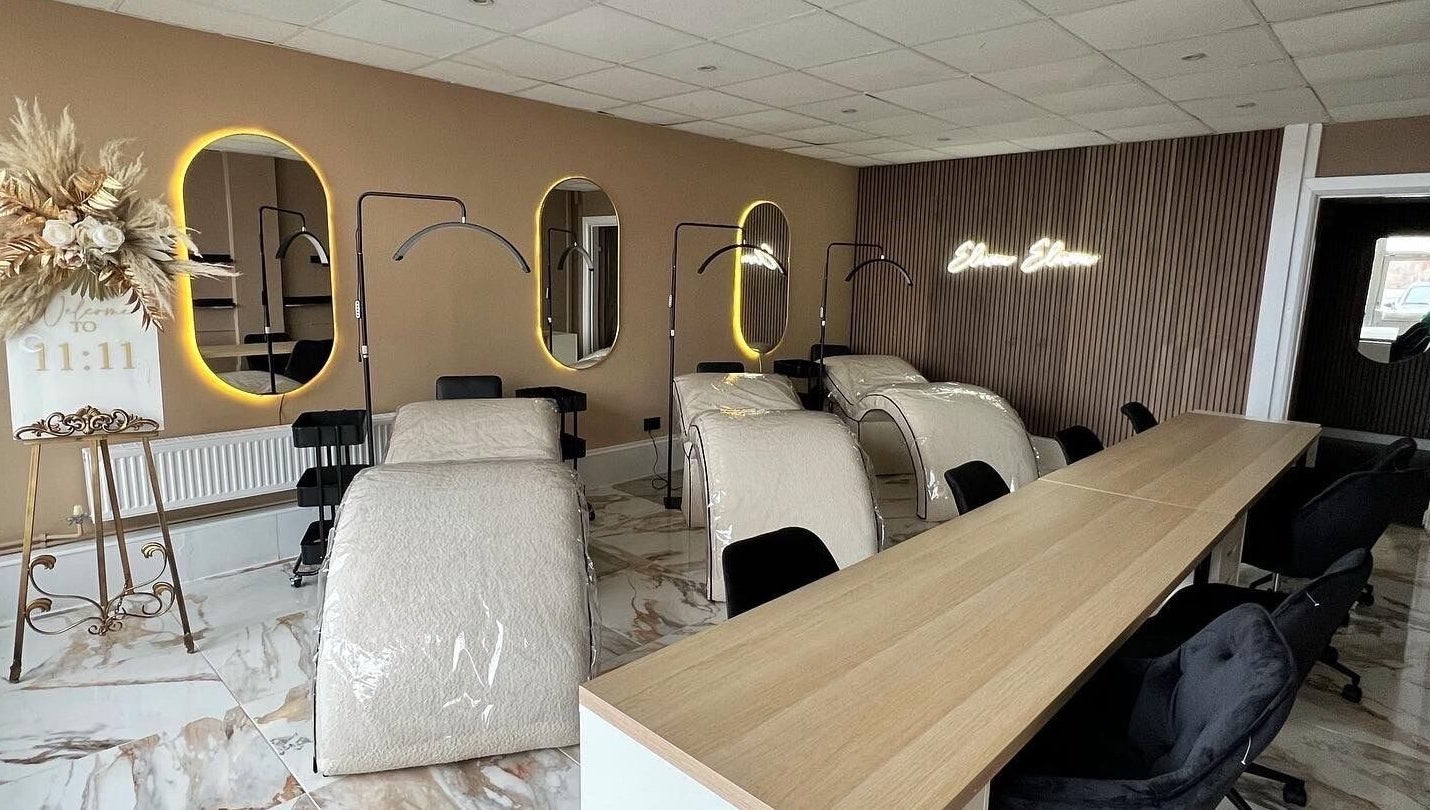 Elegant lash and brow studio at The Lash Artist at 11:11, Prestatyn, Wales, GB with plush beds and glowing mirrors.