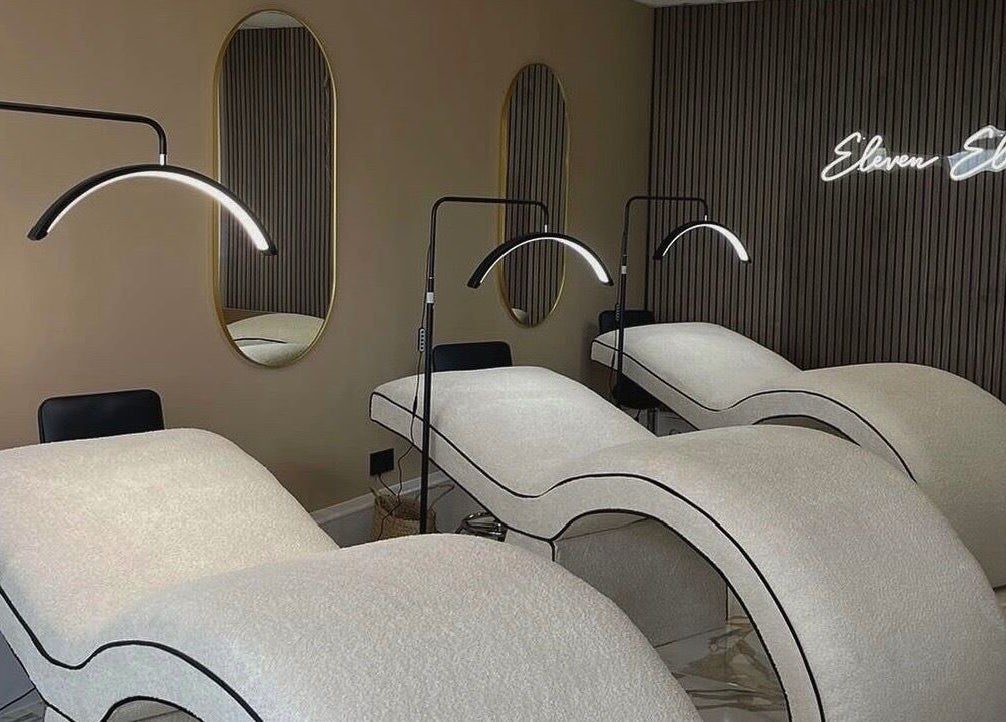 Elegant treatment beds at The Lash Artist at 11:11 in Prestatyn, Wales, GB, showcasing modern and luxurious design.