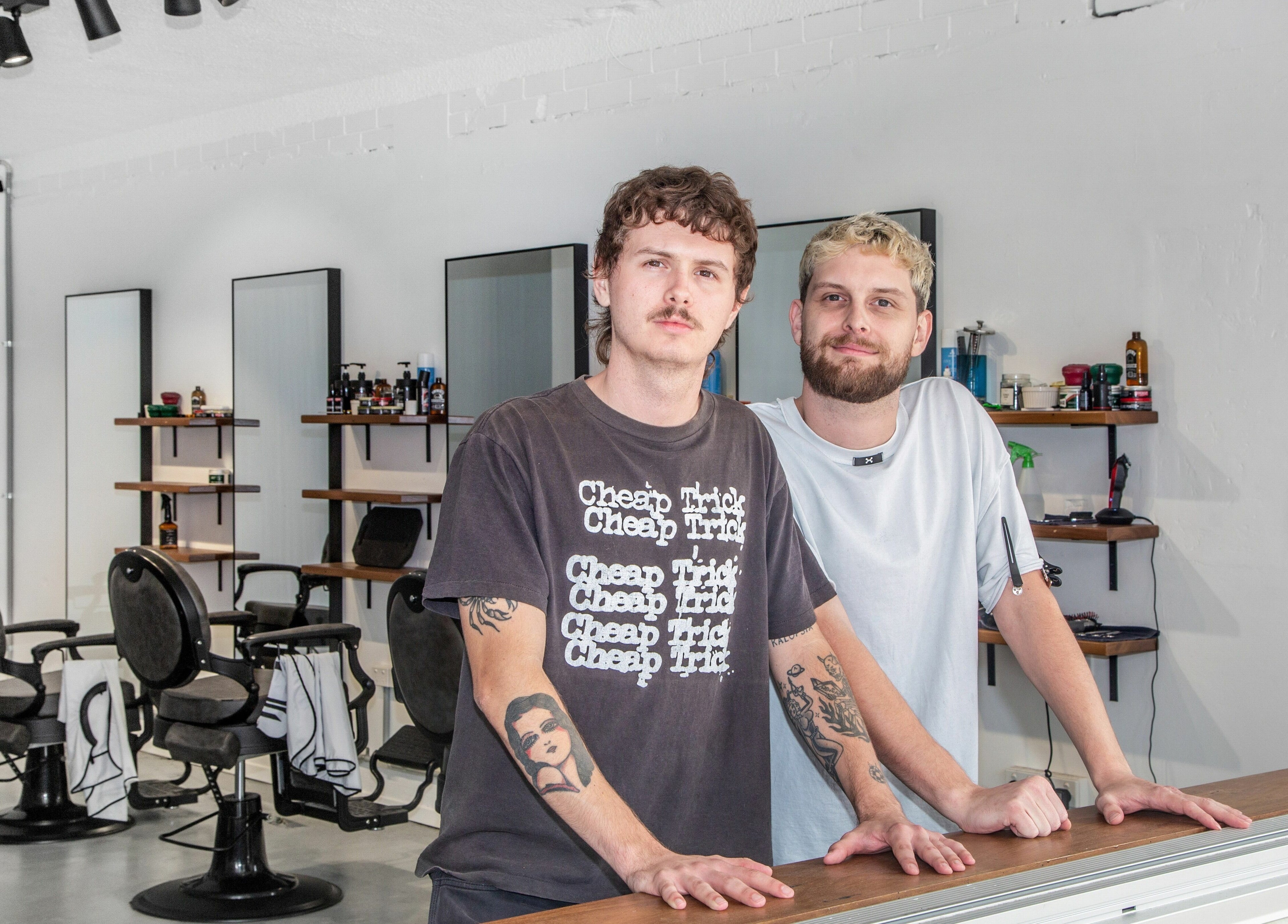 Barbers at Boy Barbershop - Coolangatta with sleek interior in Coolangatta, QLD, AU.