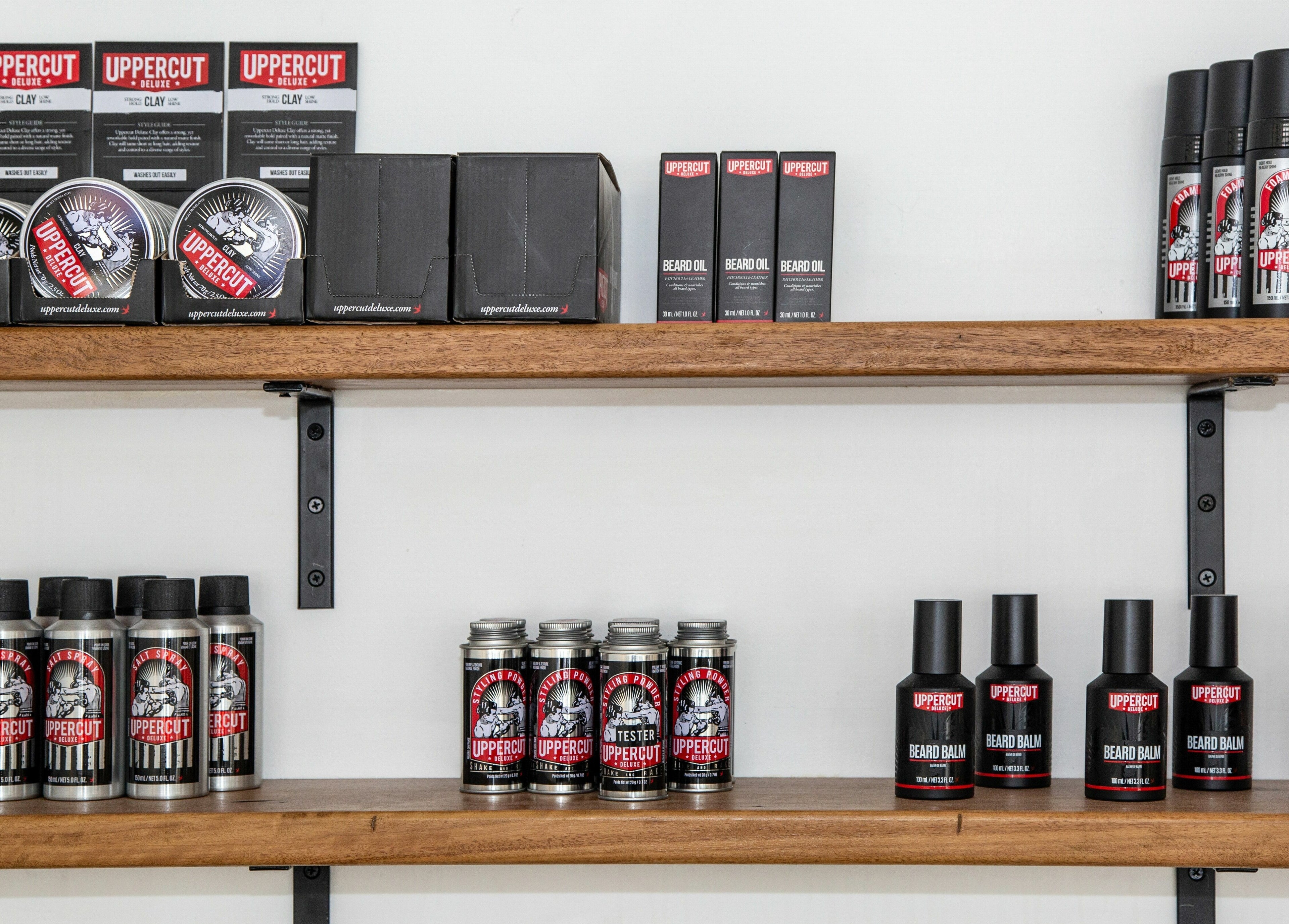 Boy Barbershop - Coolangatta shelves with grooming products. Located in Coolangatta, QLD, AU.