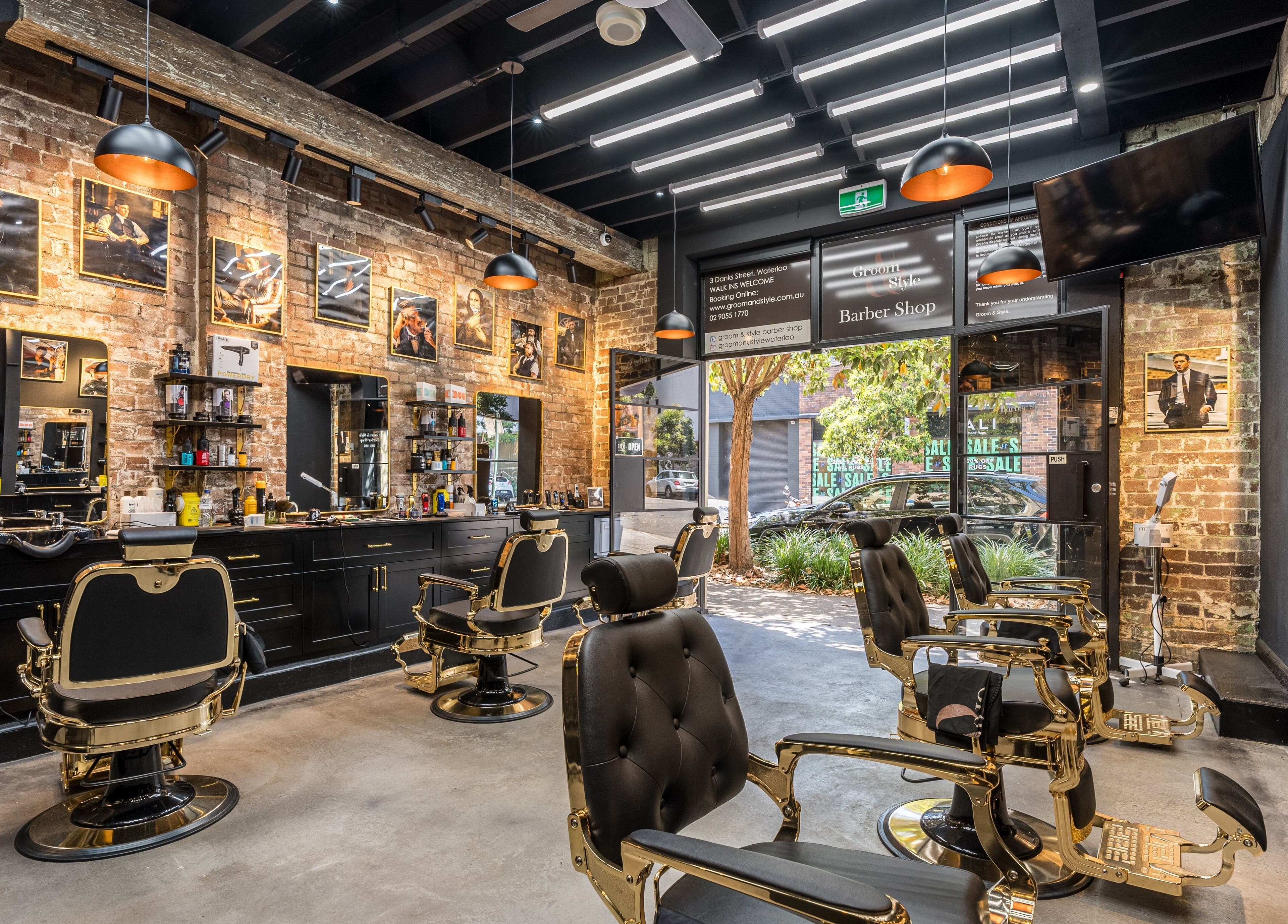 Interior of Groom & Style Barber Shop in Waterloo, New South Wales, AU, showcasing vintage barber chairs and decor.