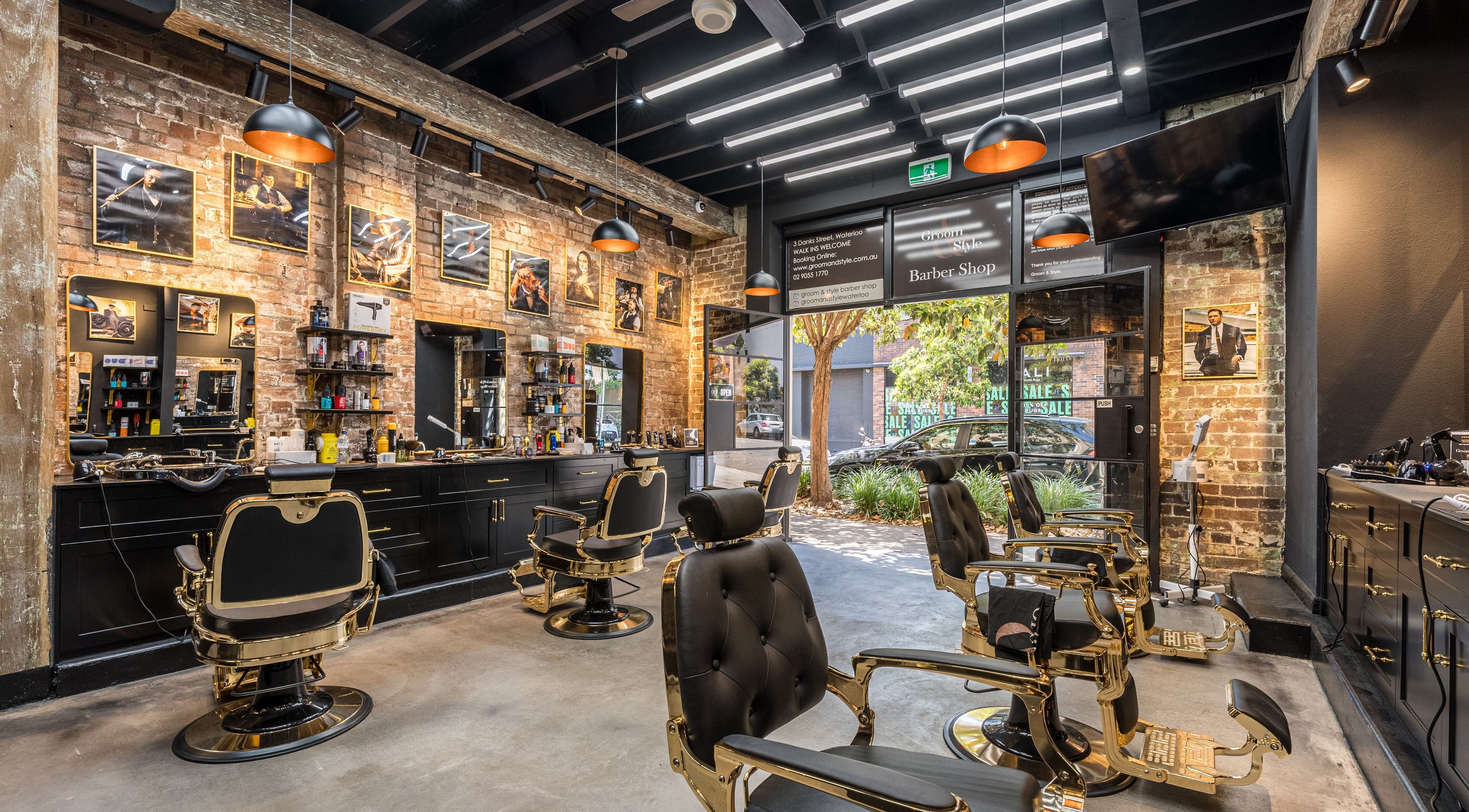 Interior of Groom & Style Barber Shop in Waterloo, New South Wales, AU, showcasing vintage barber chairs and decor.