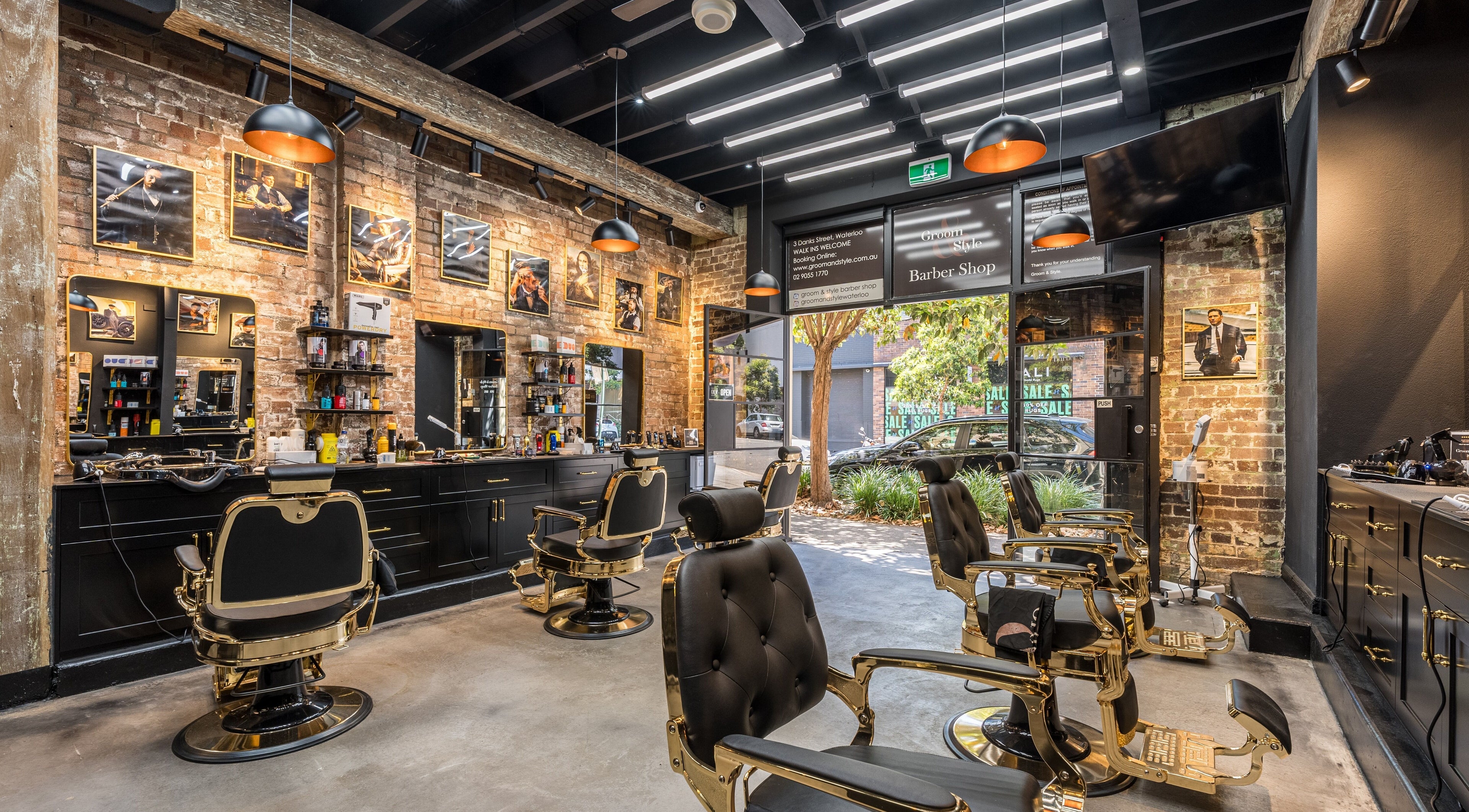 Interior of Groom & Style Barber Shop in Waterloo, New South Wales, AU, showcasing vintage barber chairs and decor.